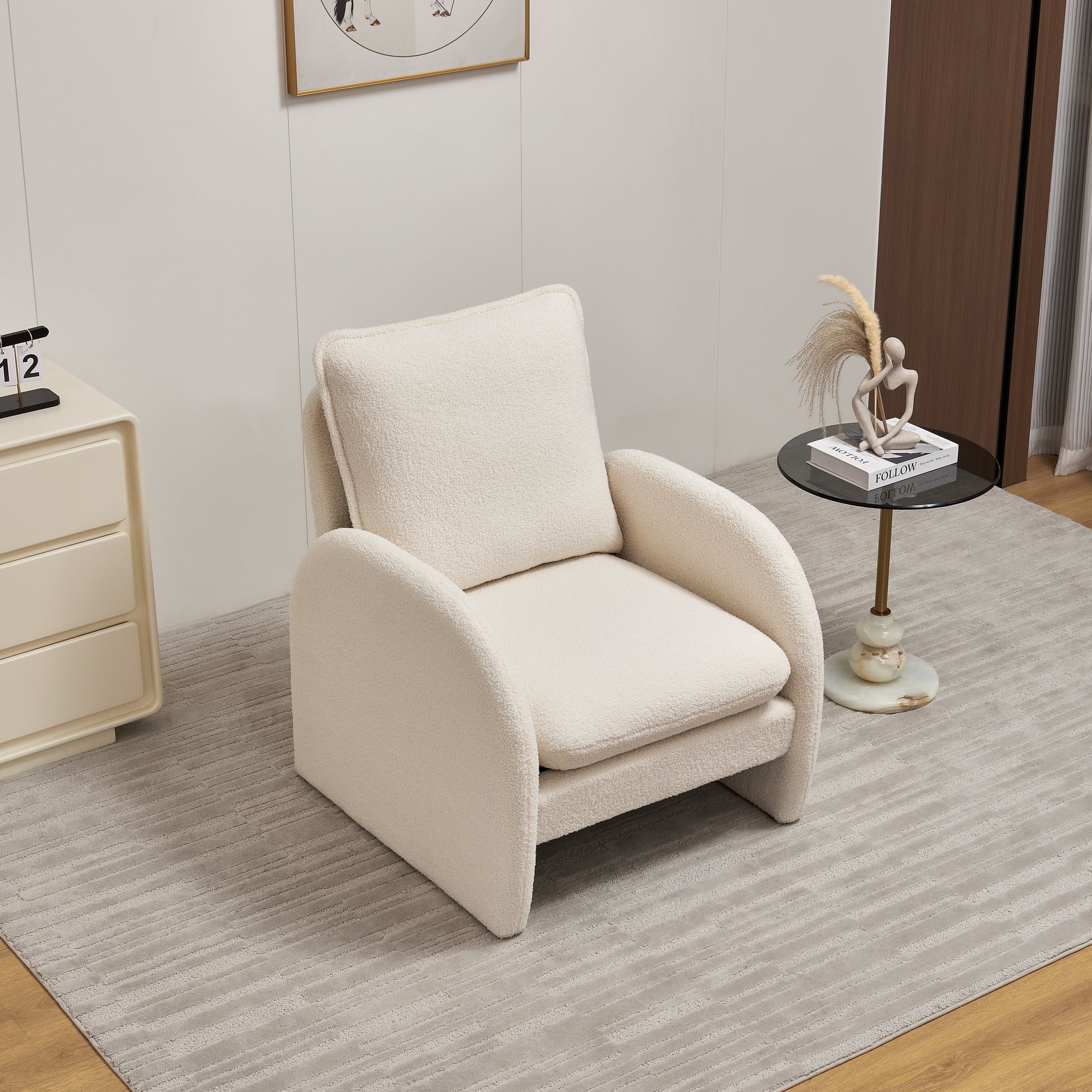 Cream boucle accent chair with plush cushions perfect for a cozy living room