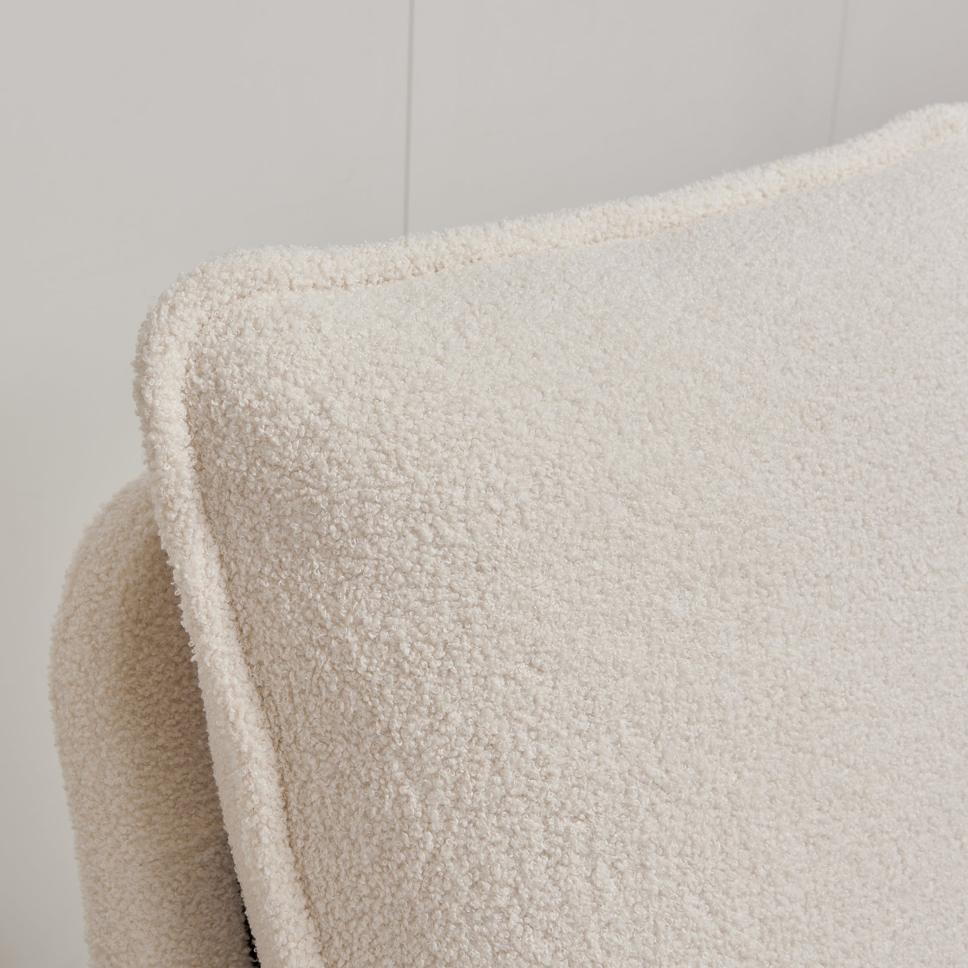 Cream teddy fabric chair detail with textured boucle upholstery