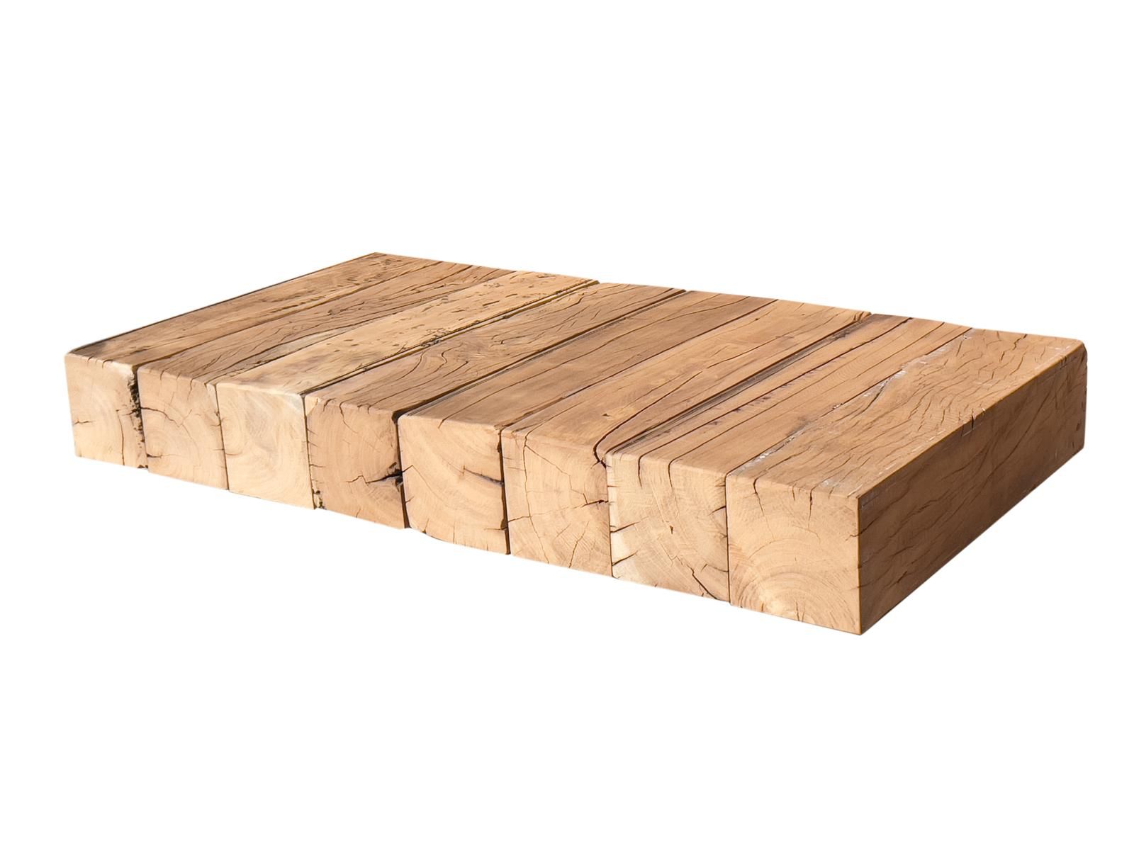 Rustic reclaimed wood coffee table with natural grain and roughhewn texture