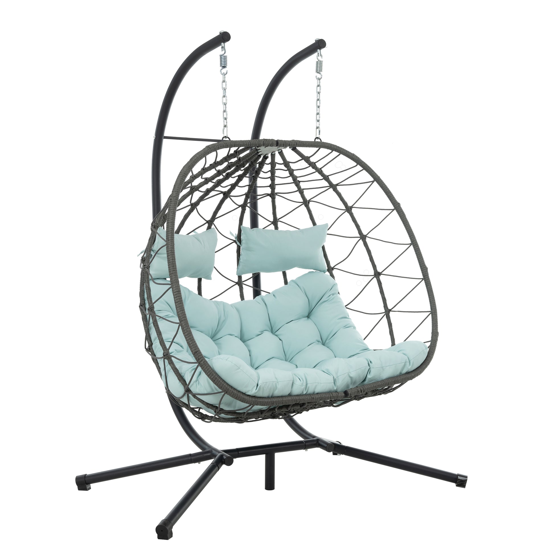 Grey rattan hanging egg chair with plush light blue cushions and metal stand