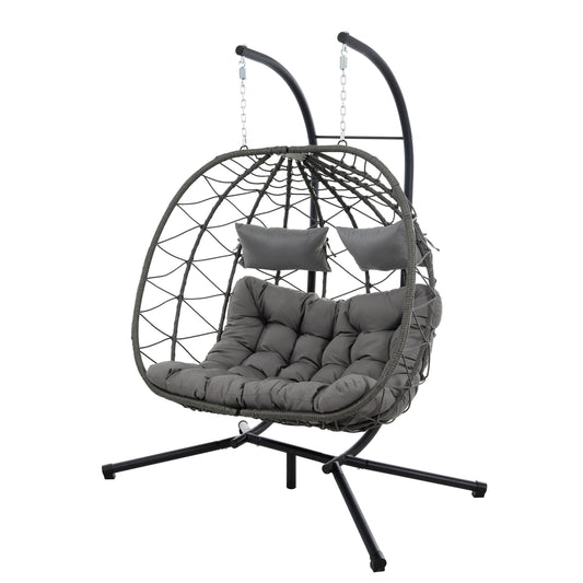Woven grey egg chair with plush cushions and metal stand ideal for outdoor seating