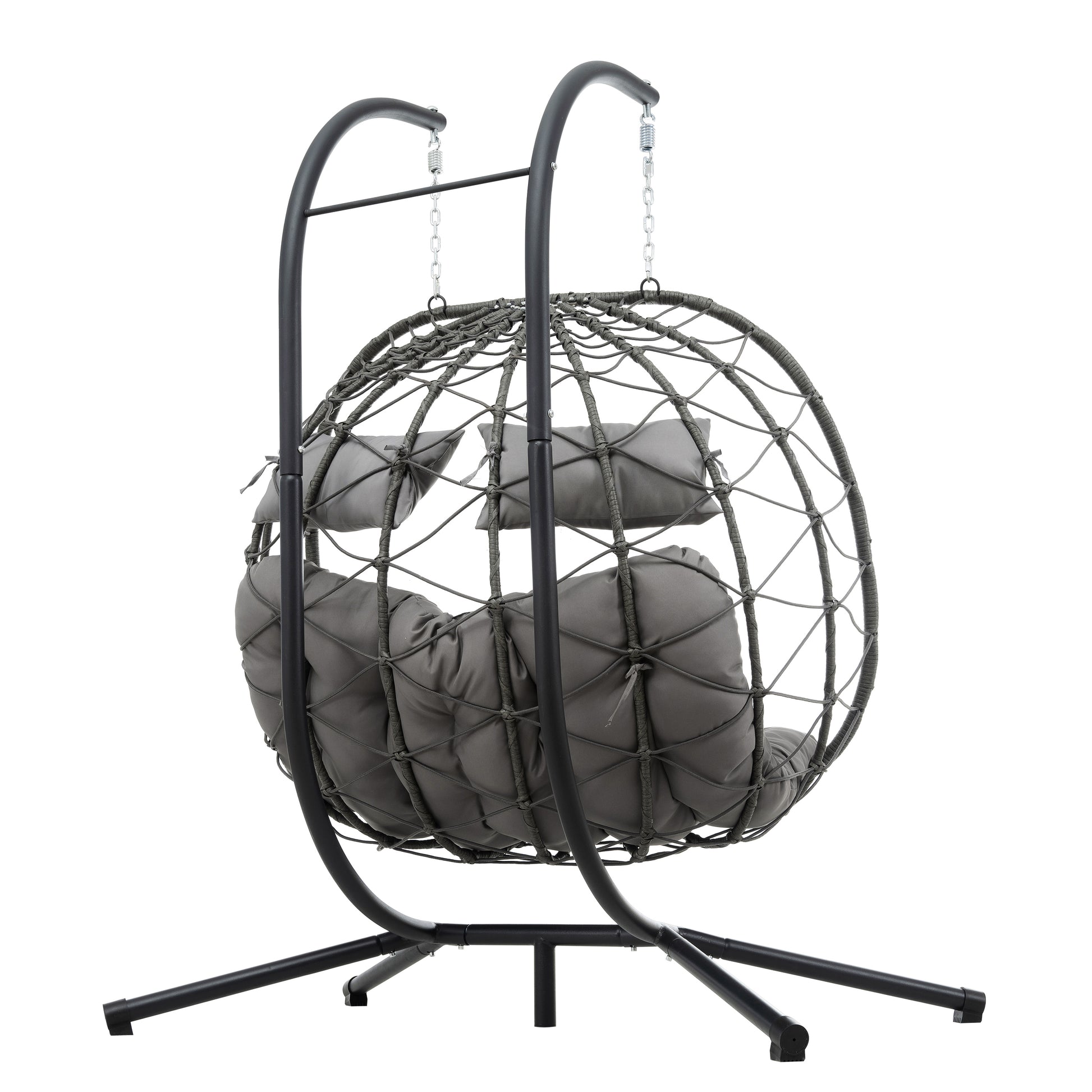 Grey wicker egg hanging chair with plush cushions perfect for patio relaxation