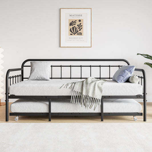 Black metal daybed with pullout trundle and grey plaid pillow