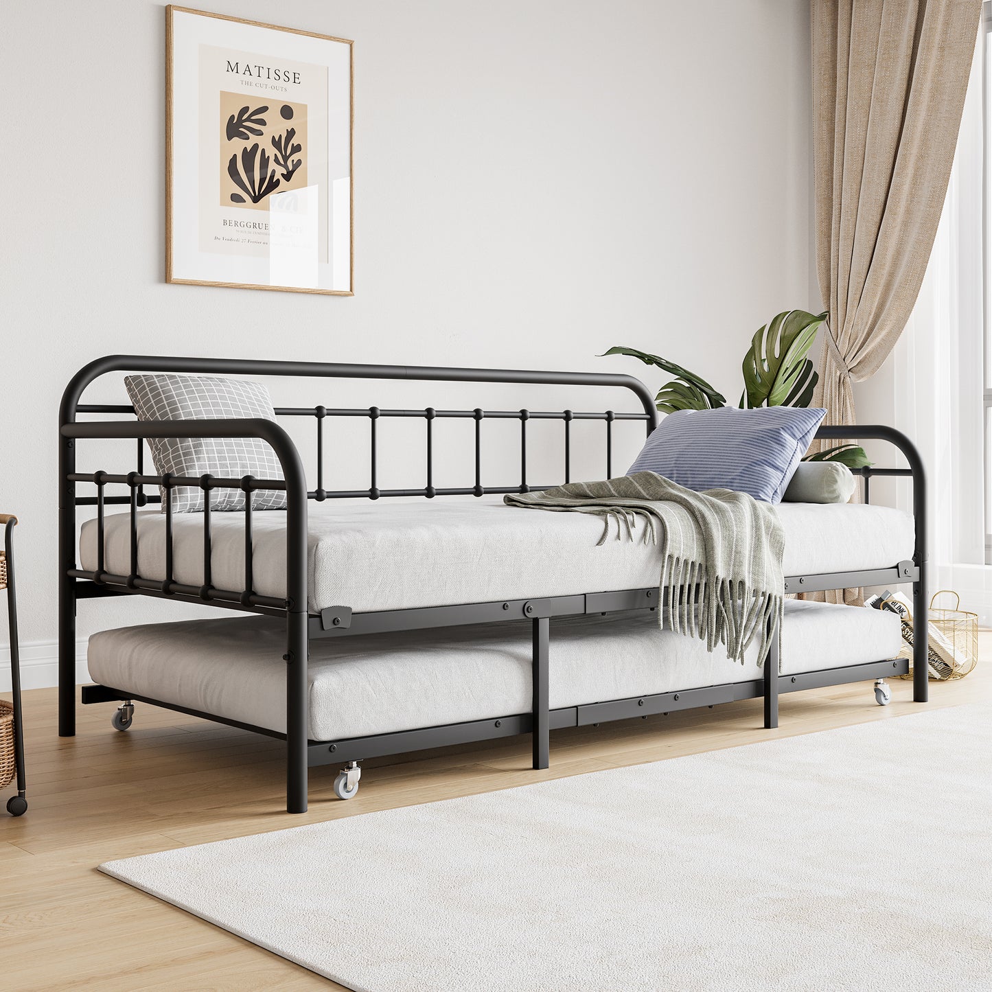 Black metal daybed with pullout trundle perfect for guest rooms or small spaces