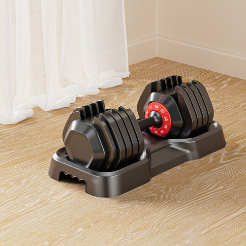 Adjustable dumbbell set with black plates and red weight indicator dial for home gym workouts