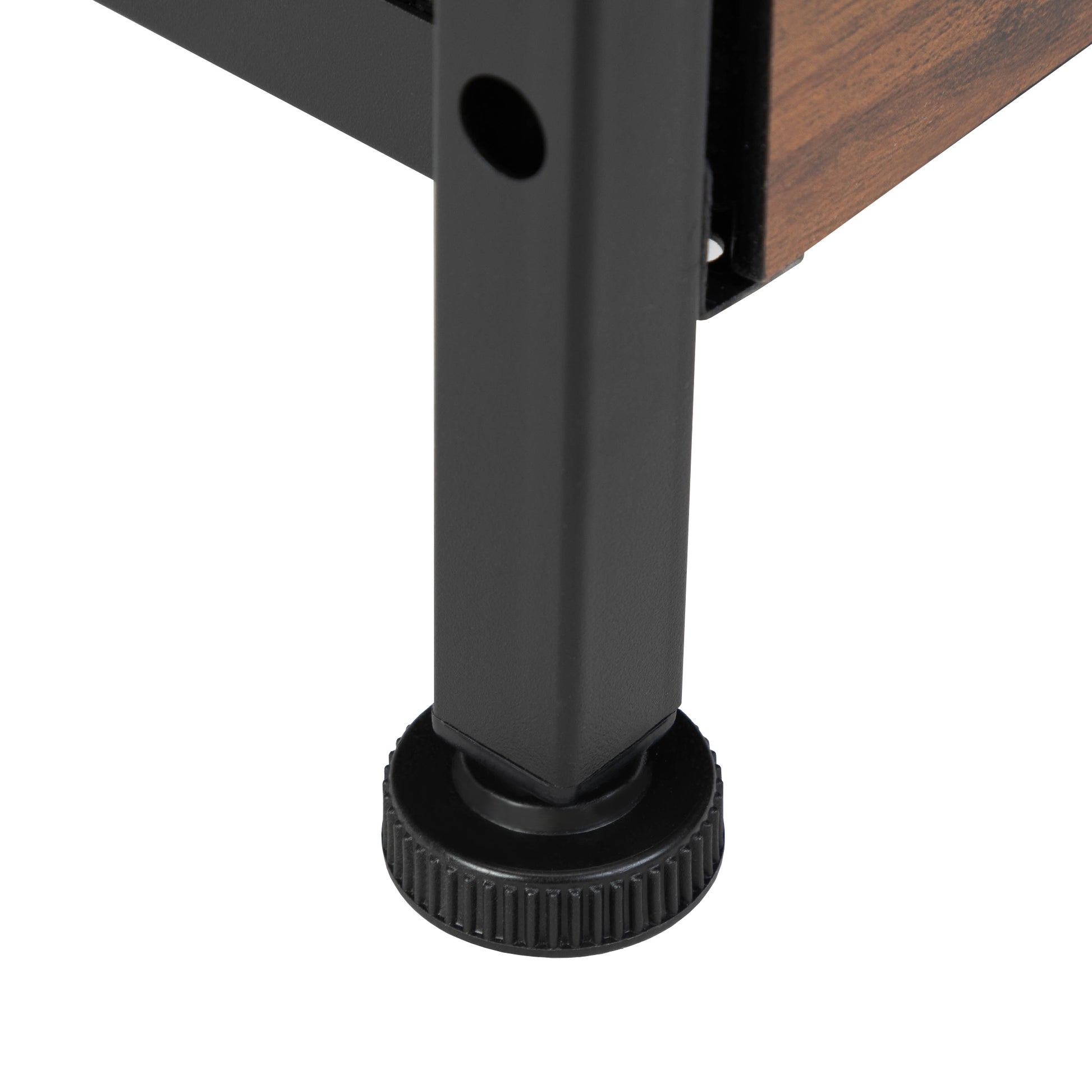 Closeup of a black metal shelf leg with adjustable foot for stability