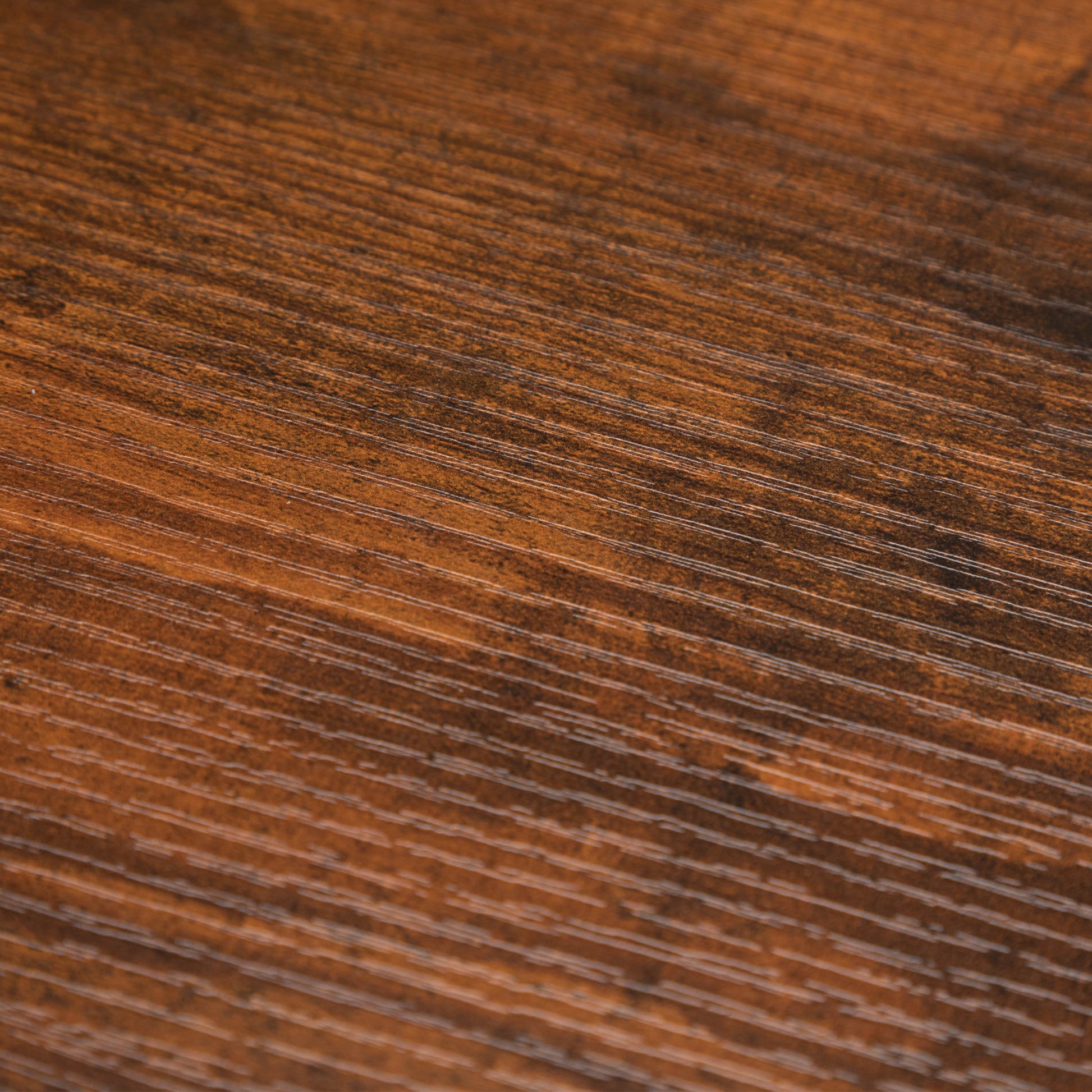 Rich dark walnut wood grain texture closeup
