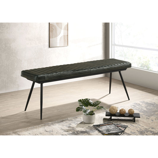 Dark green tufted leather bench with slender black metal legs