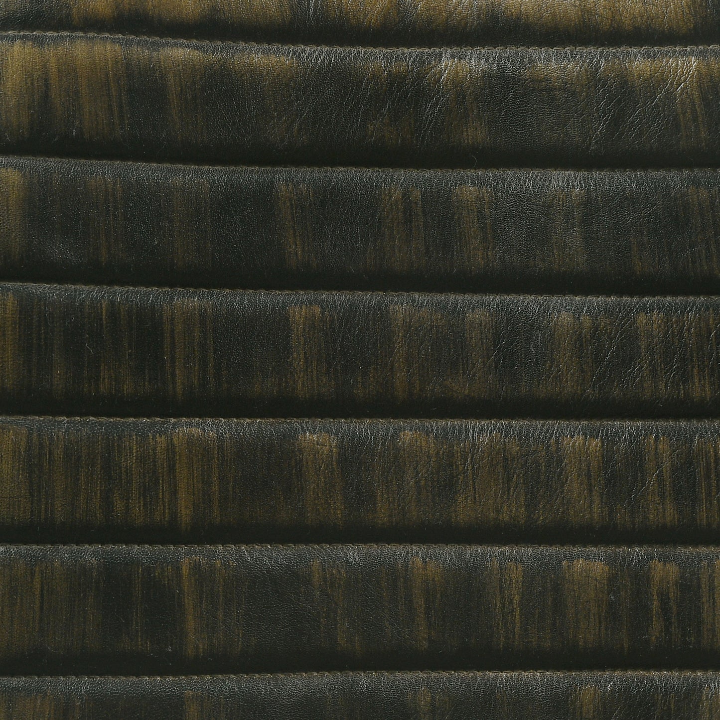 Dark brown quilted faux leather upholstery with distressed finish