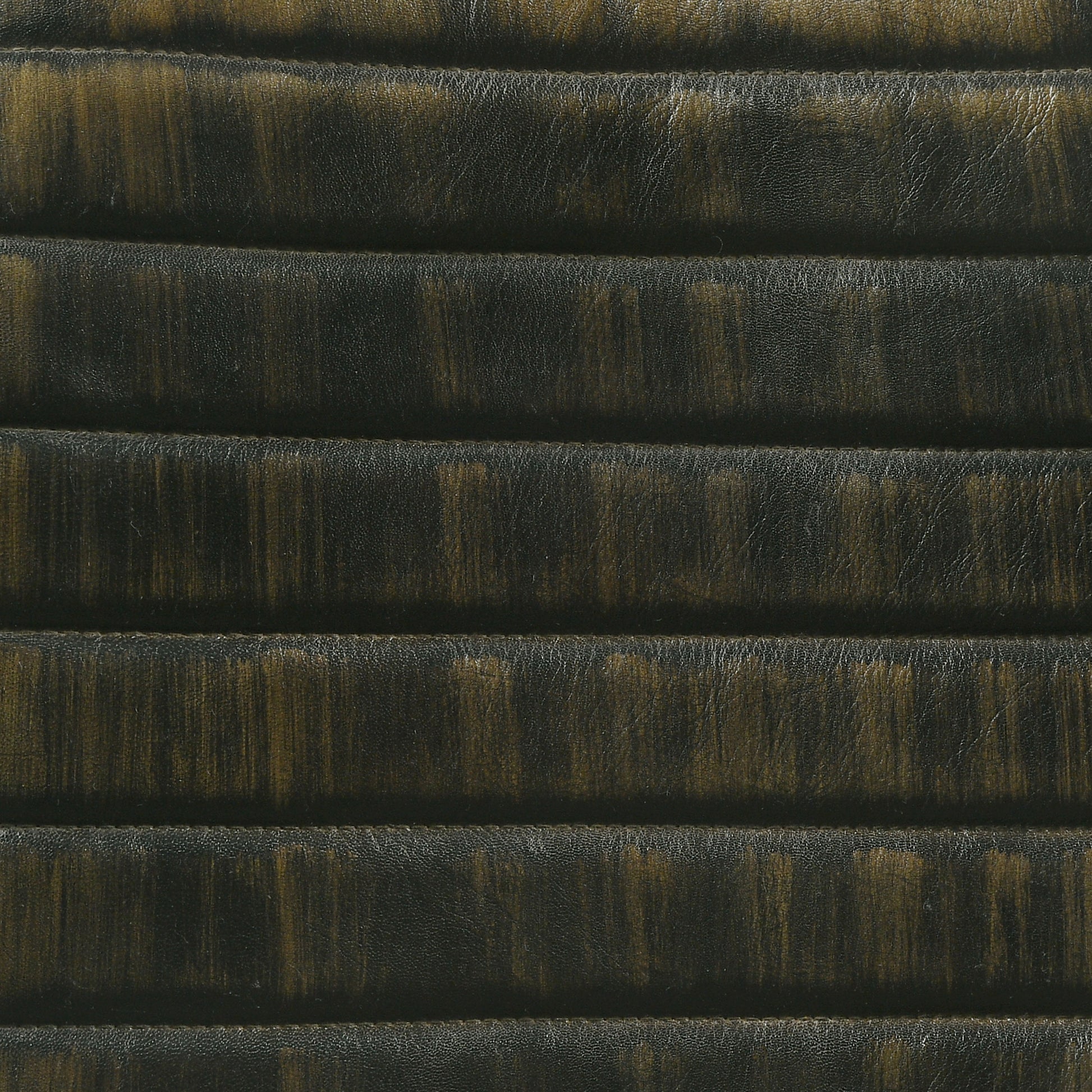 Dark brown quilted faux leather upholstery with distressed finish