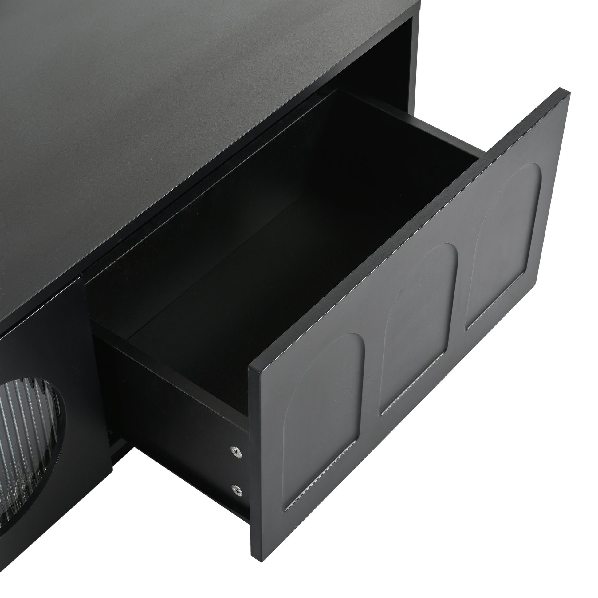 Black media console with an open drawer and arched panel detail