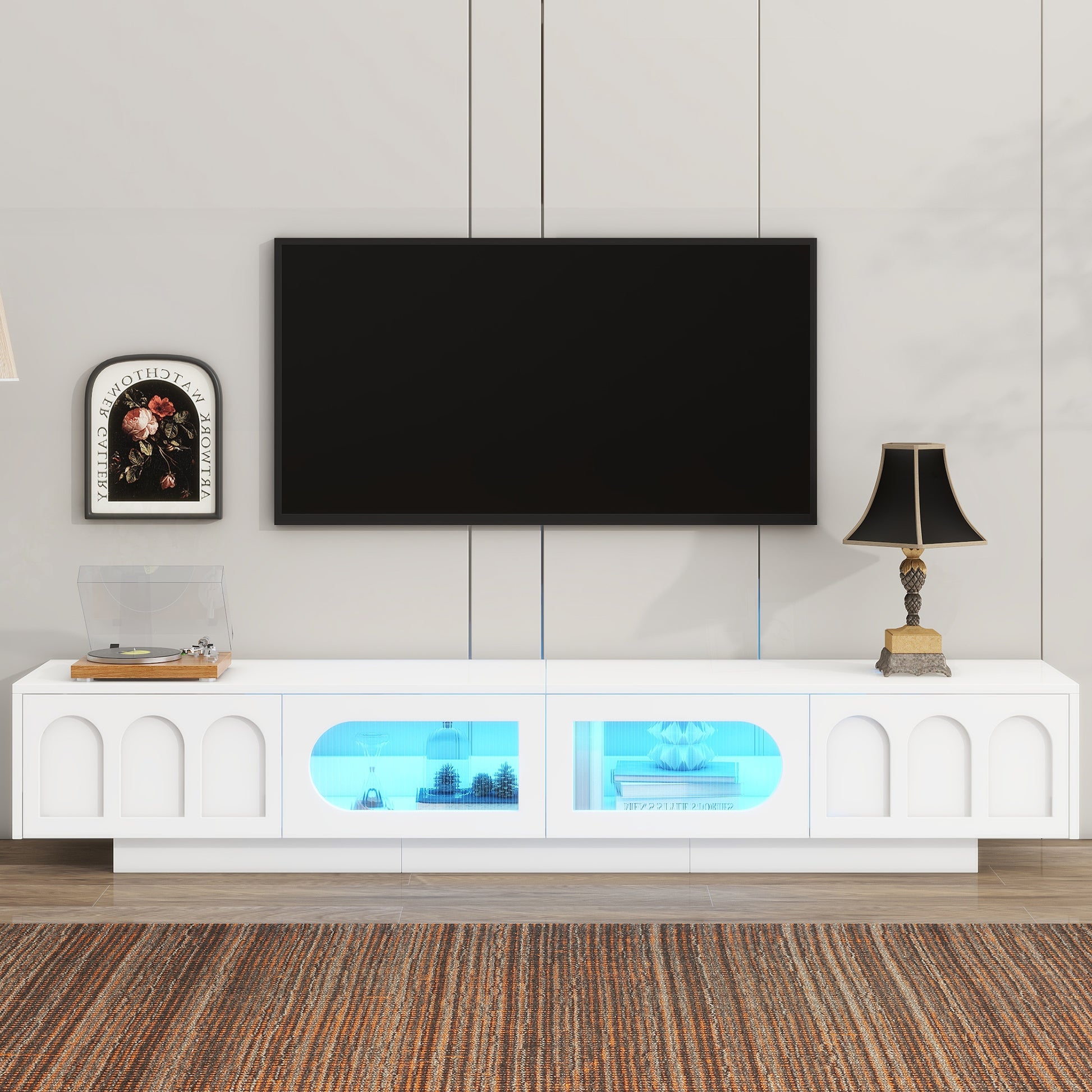 White modern media console with arched doors and LED lighting for living room