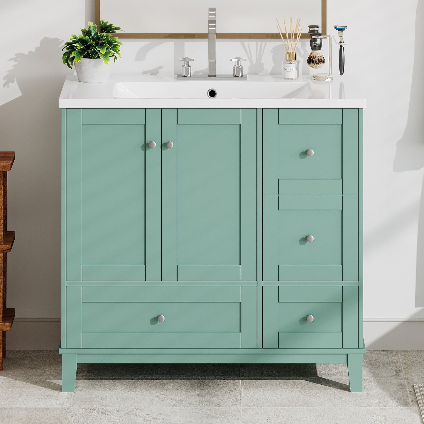 Seafoam green bathroom vanity with white countertop silver knobs and modern faucet