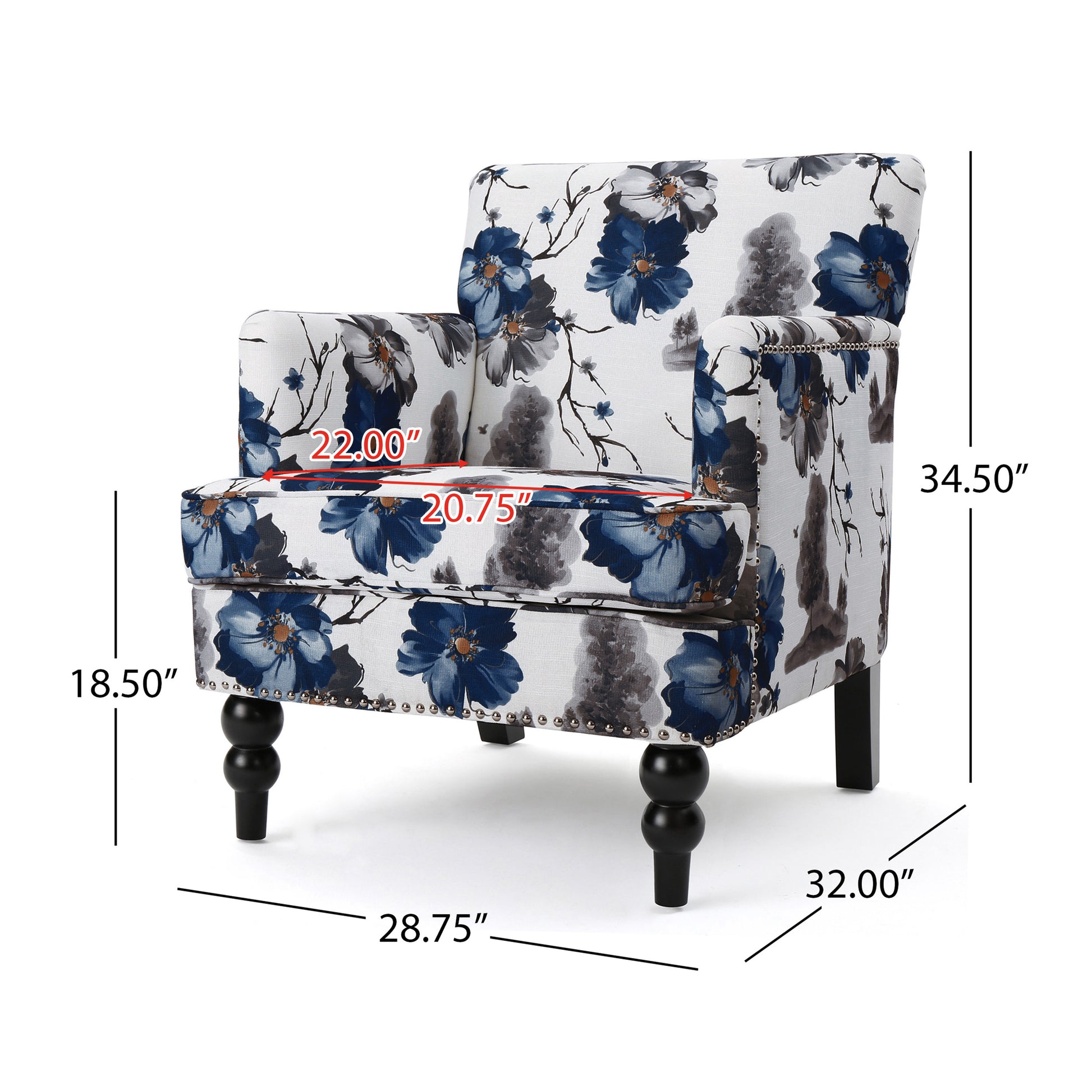 Accent chair with bold blue floral print on white fabric featuring tufted arms and silver nailhead trim
