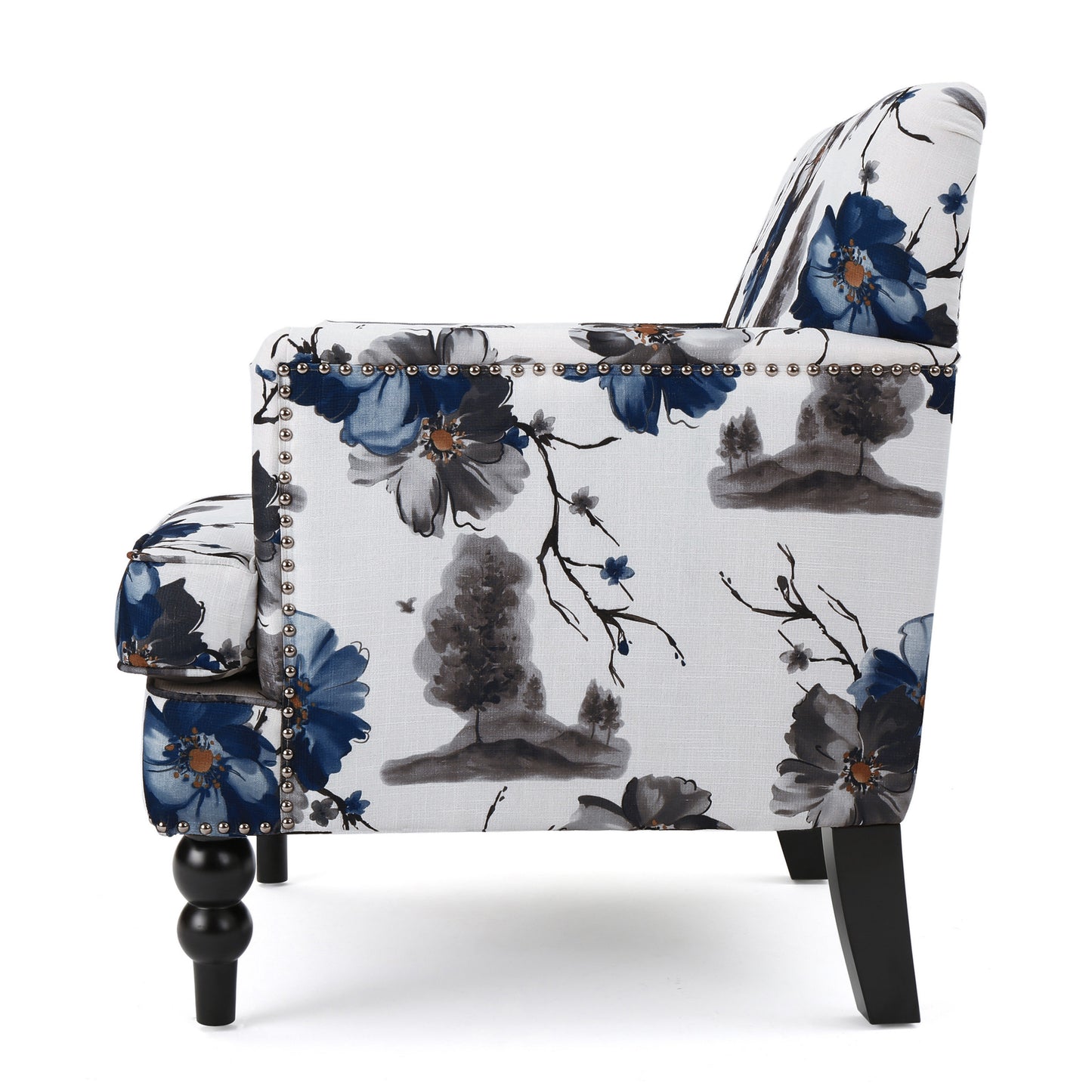Armchair with blue floral print fabric upholstery silver nailhead trim and dark wood legs
