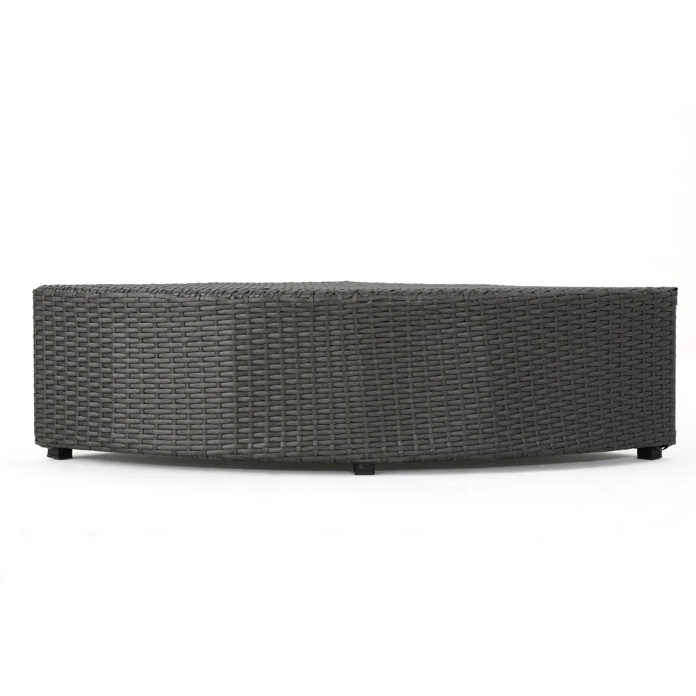 Curved grey wicker outdoor bench with black feet