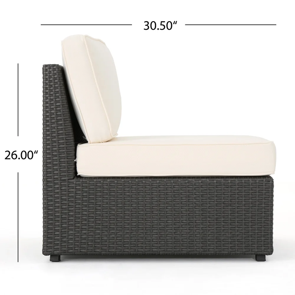Sectional sofa armless chair with dark gray rattan weave and cream cushions