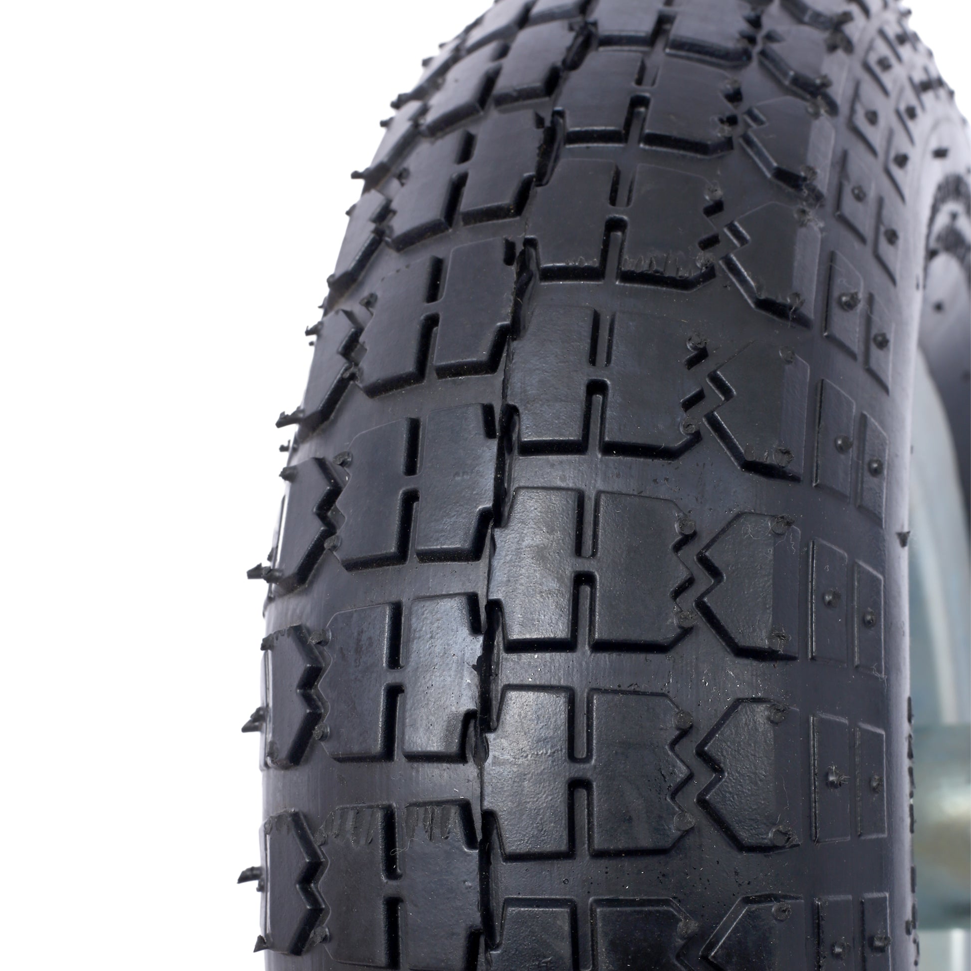 Closeup of a black heavyduty rubber tire tread with a textured pattern
