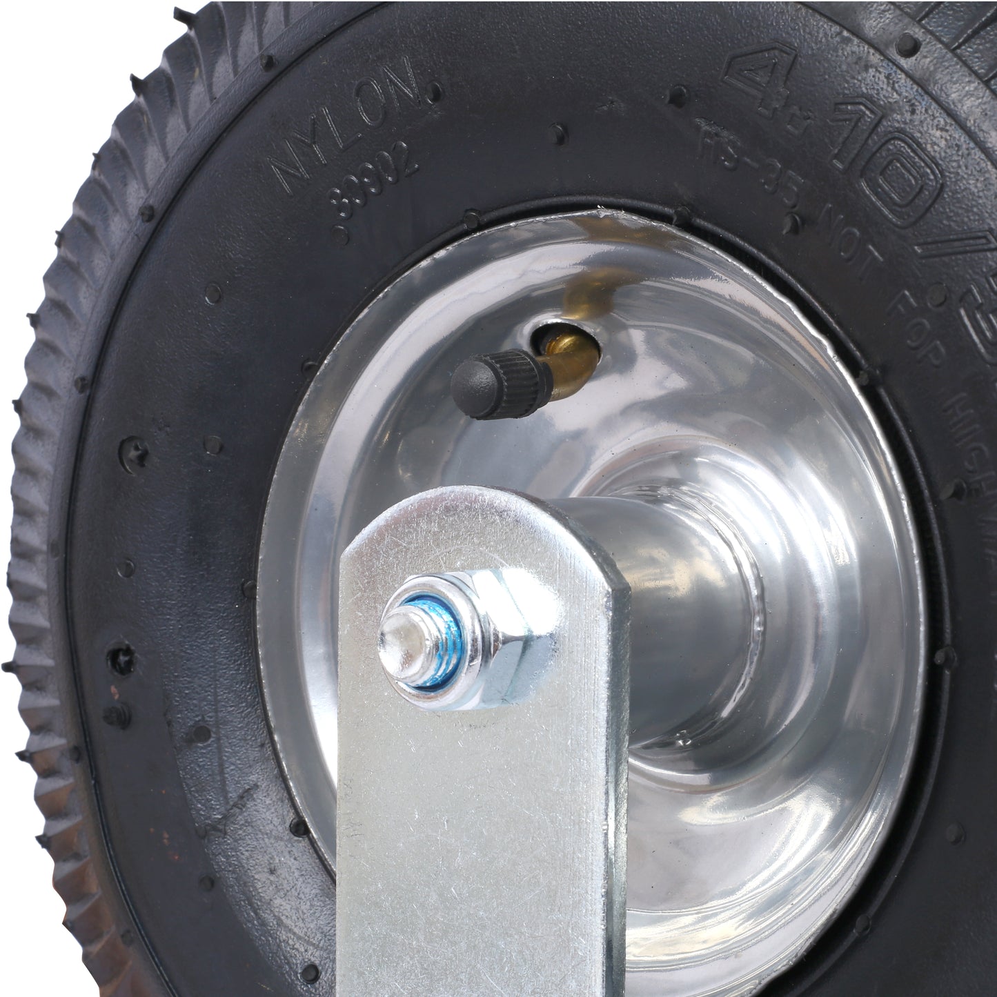Black pneumatic tire with ribbed tread and silver metal wheel hub