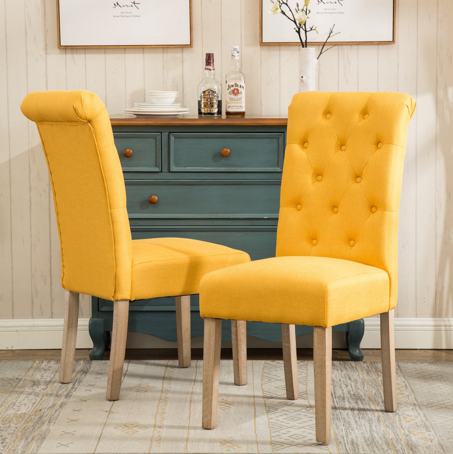 Tufted yellow linen dining chair with carved wooden legs for elegant home decor
