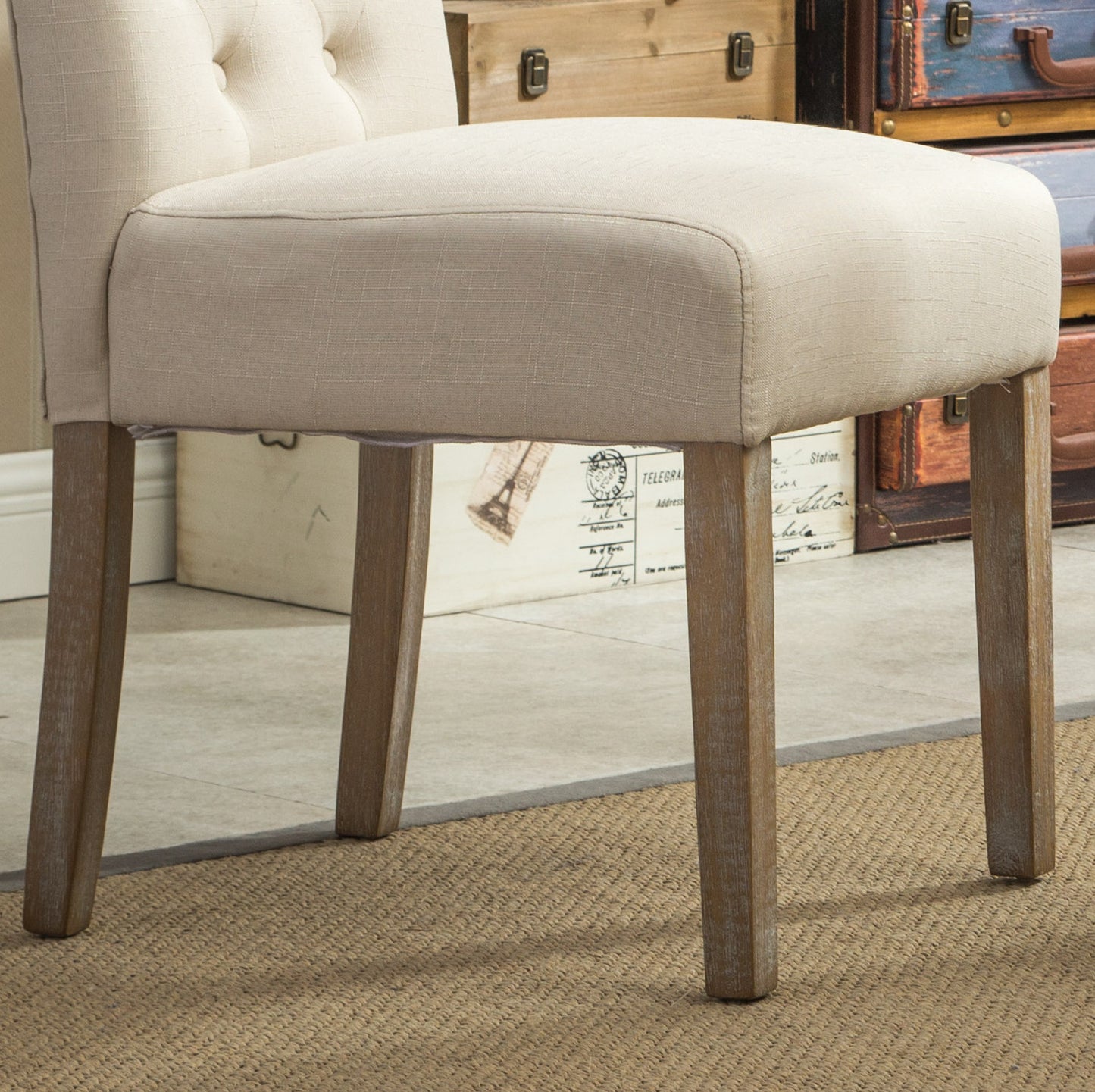 Cream upholstered tufted accent chair with natural wood legs