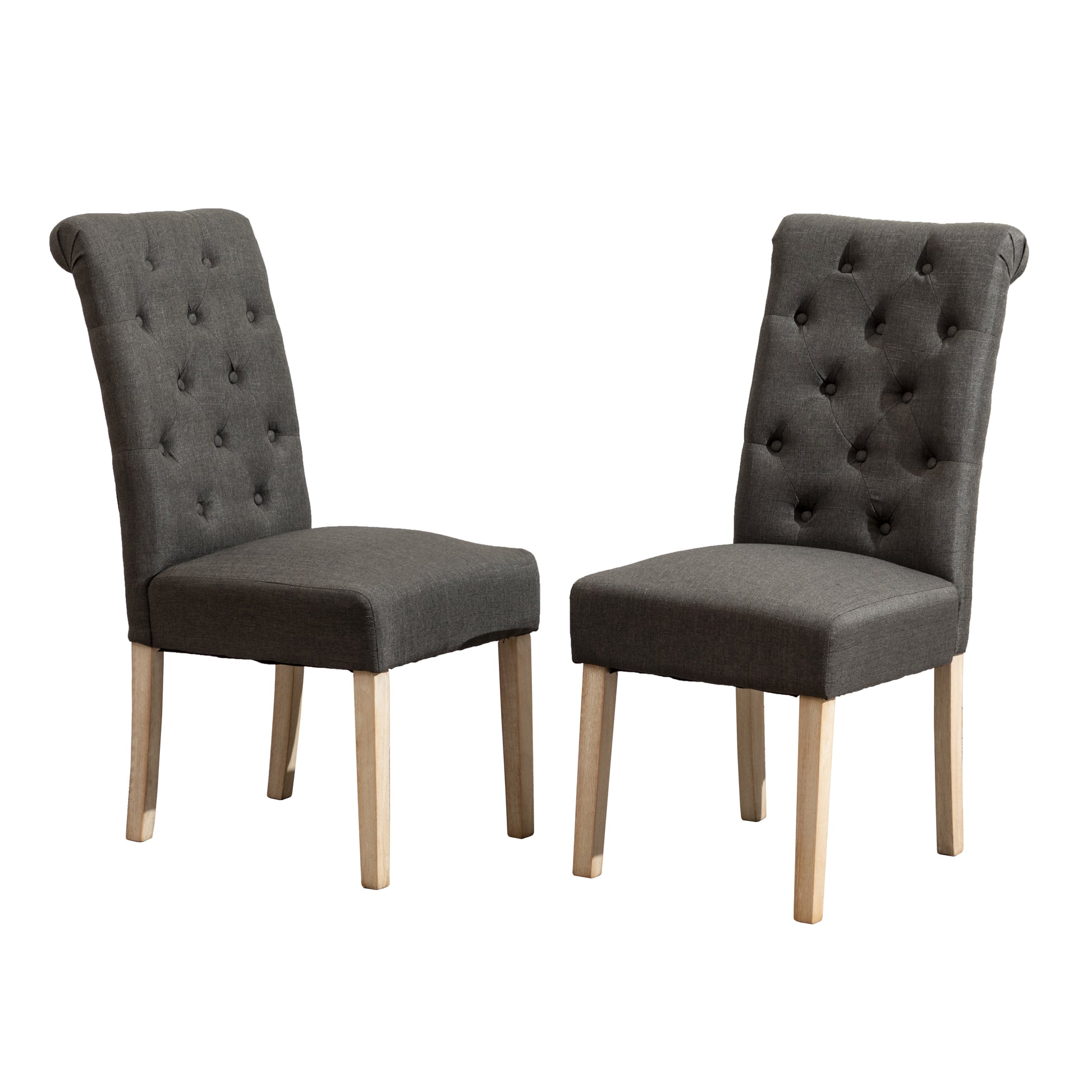 Pair of dark gray fabric dining chairs with tufted backs and light wood legs