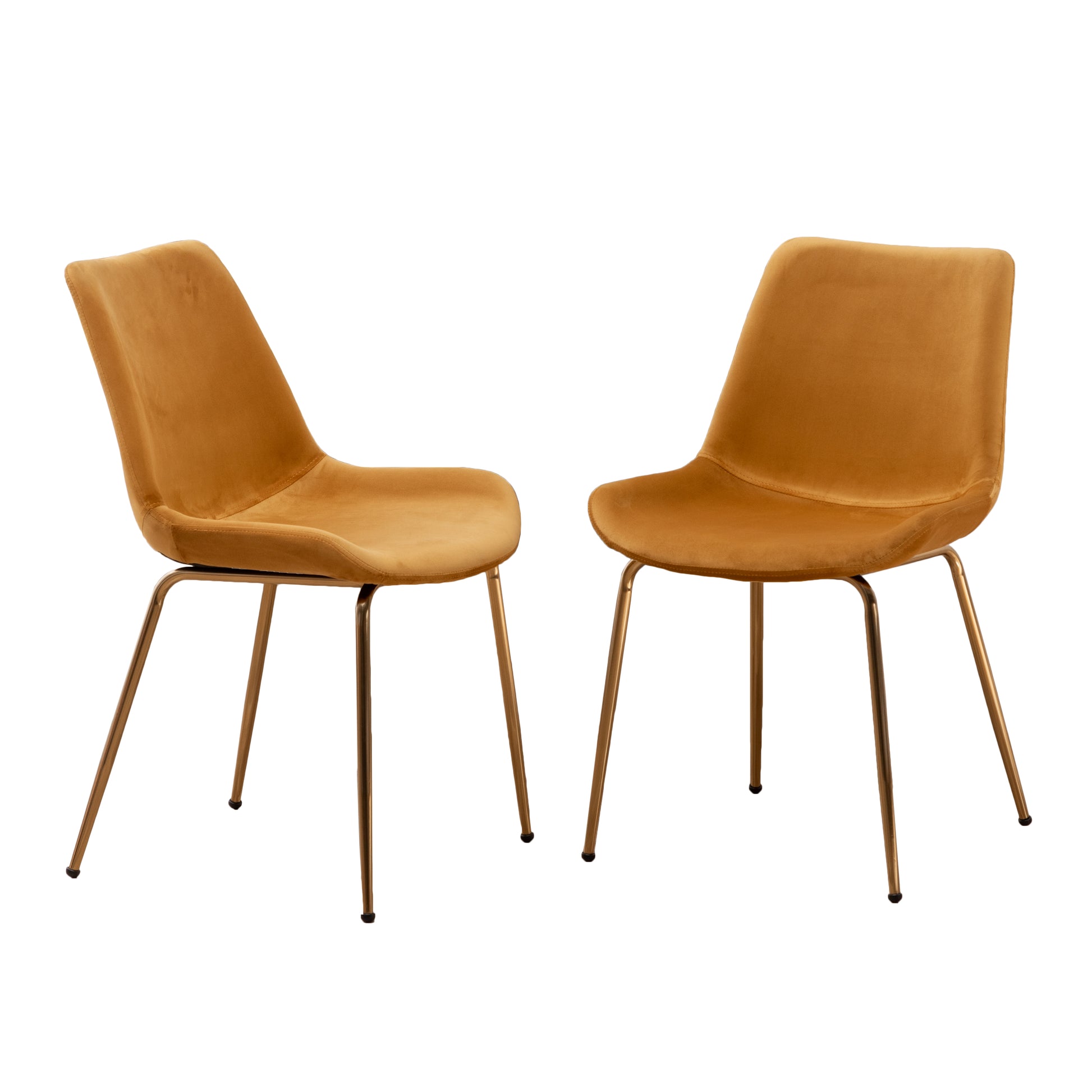 Two mustard velvet accent chairs with sleek gold metal legs for modern dining rooms