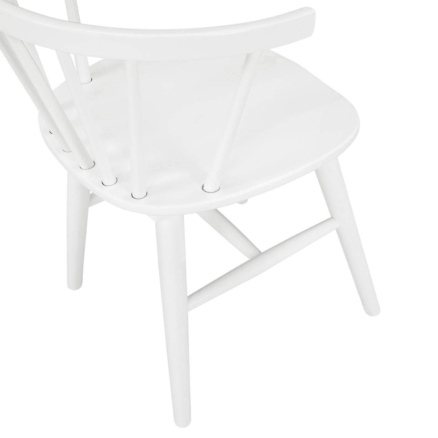 White spindle back dining chair with curved seat and four tapered legs