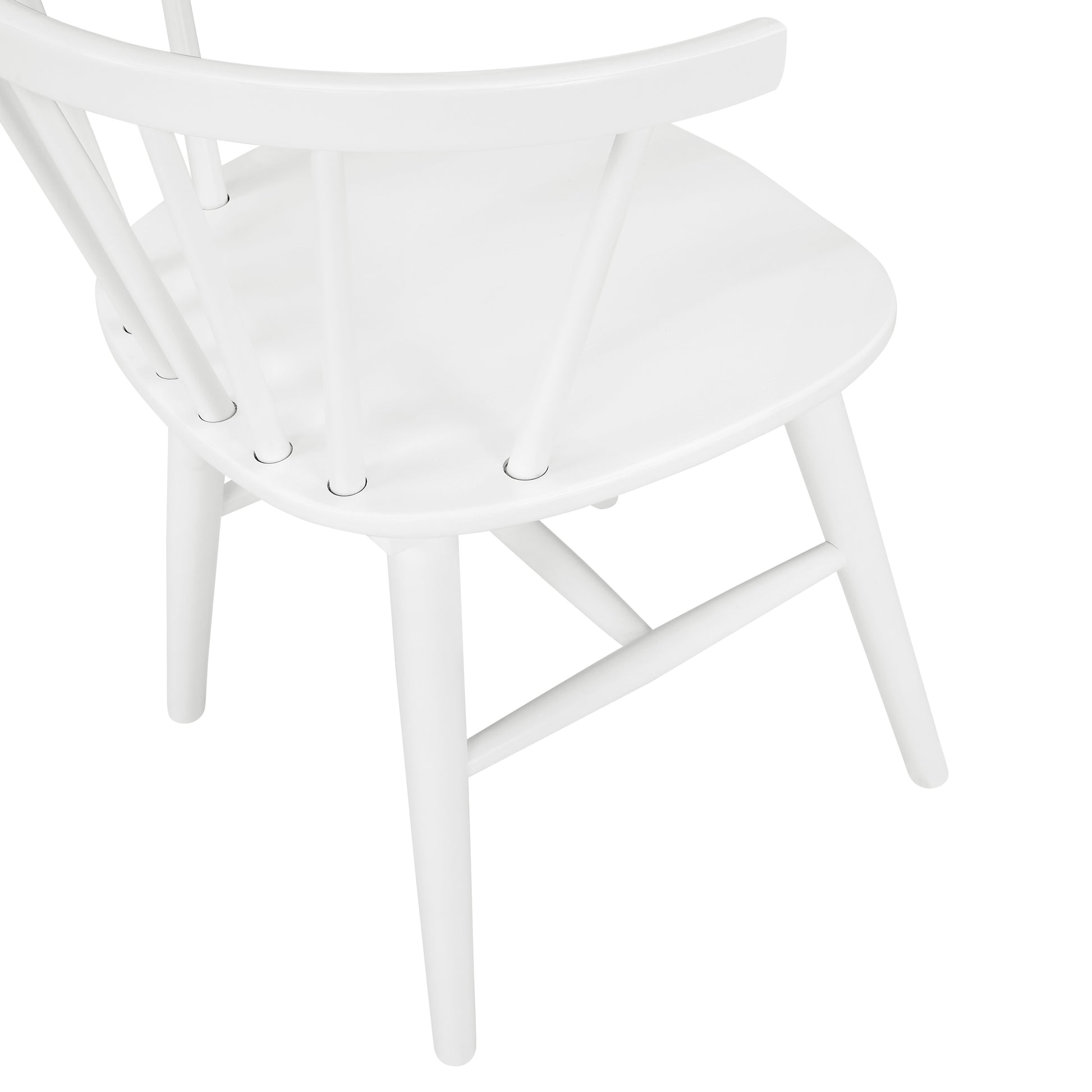 White spindle back dining chair with curved seat and four tapered legs
