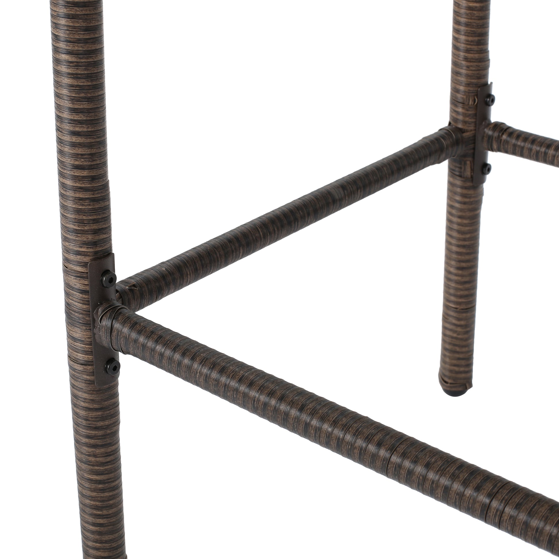 Dark brown rattan weave on outdoor furniture legs and support bars