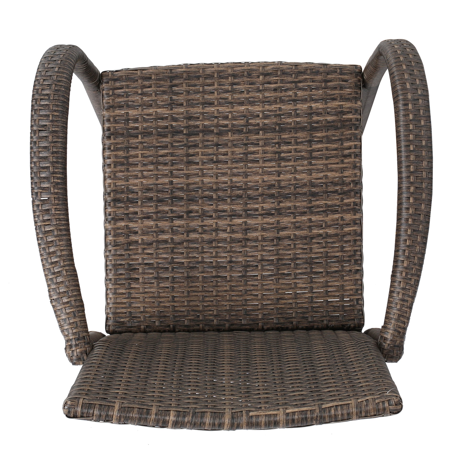 Closeup of a brown woven wicker chair seat with curved armrests