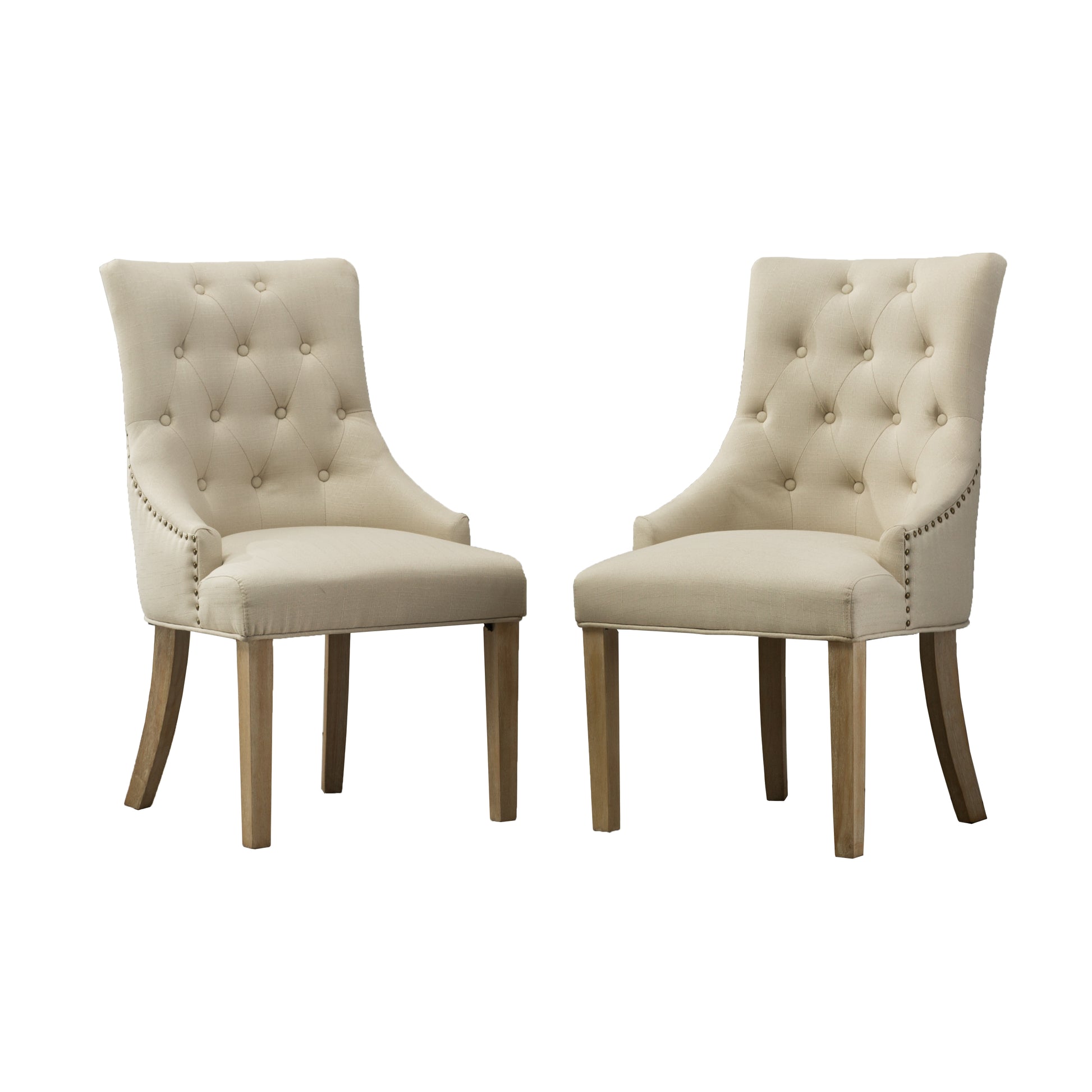 Two tufted linen dining chairs in beige with silver nailhead trim and wooden legs
