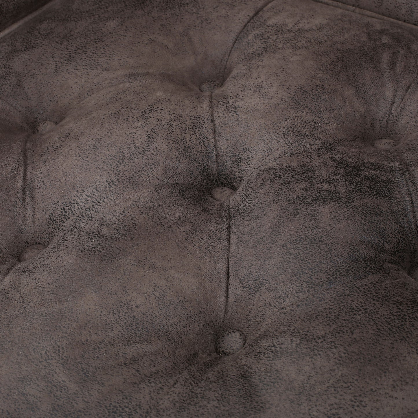 Dark brown textured faux leather with diamond tufting detail for accent chairs
