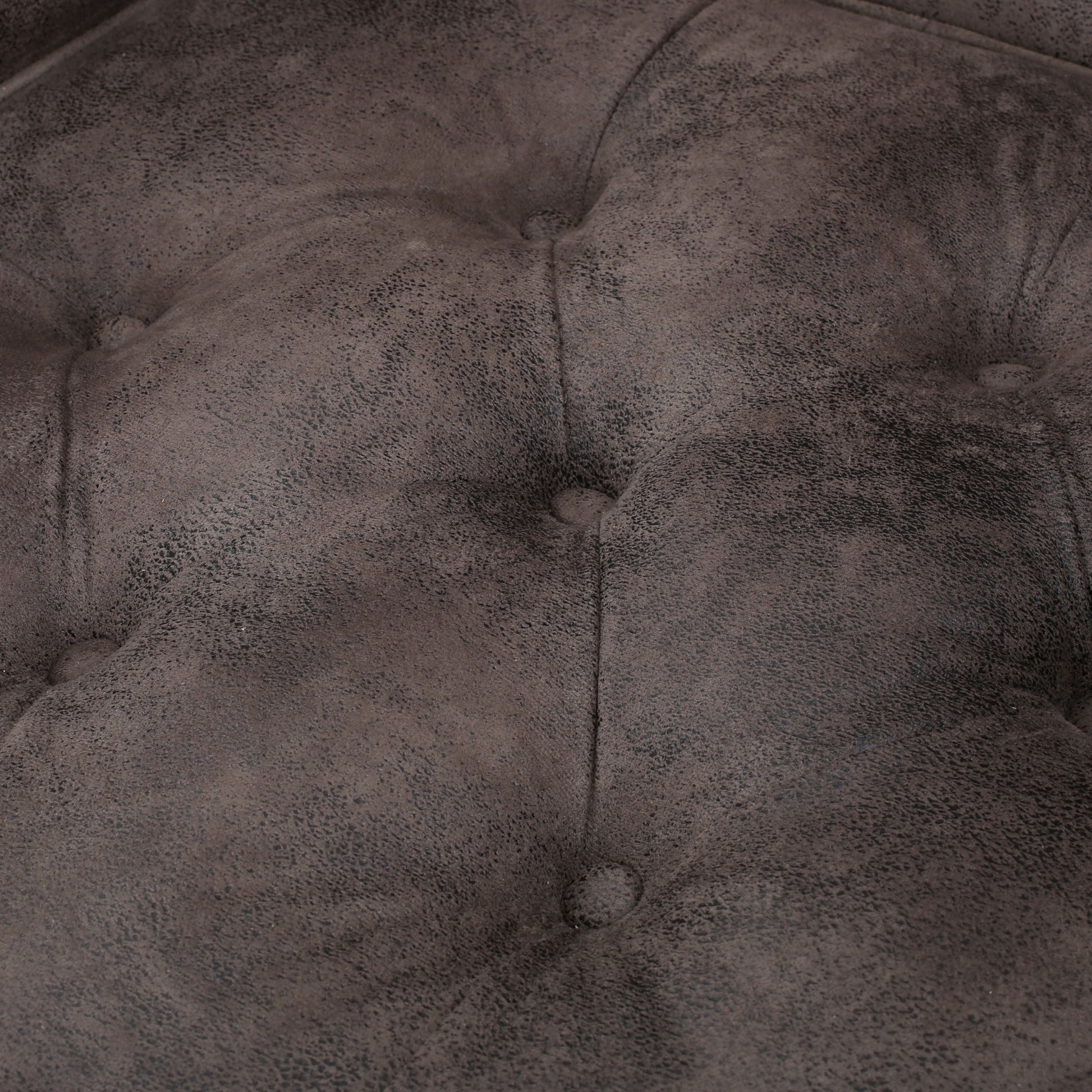 Dark brown textured faux leather with diamond tufting detail for accent chairs
