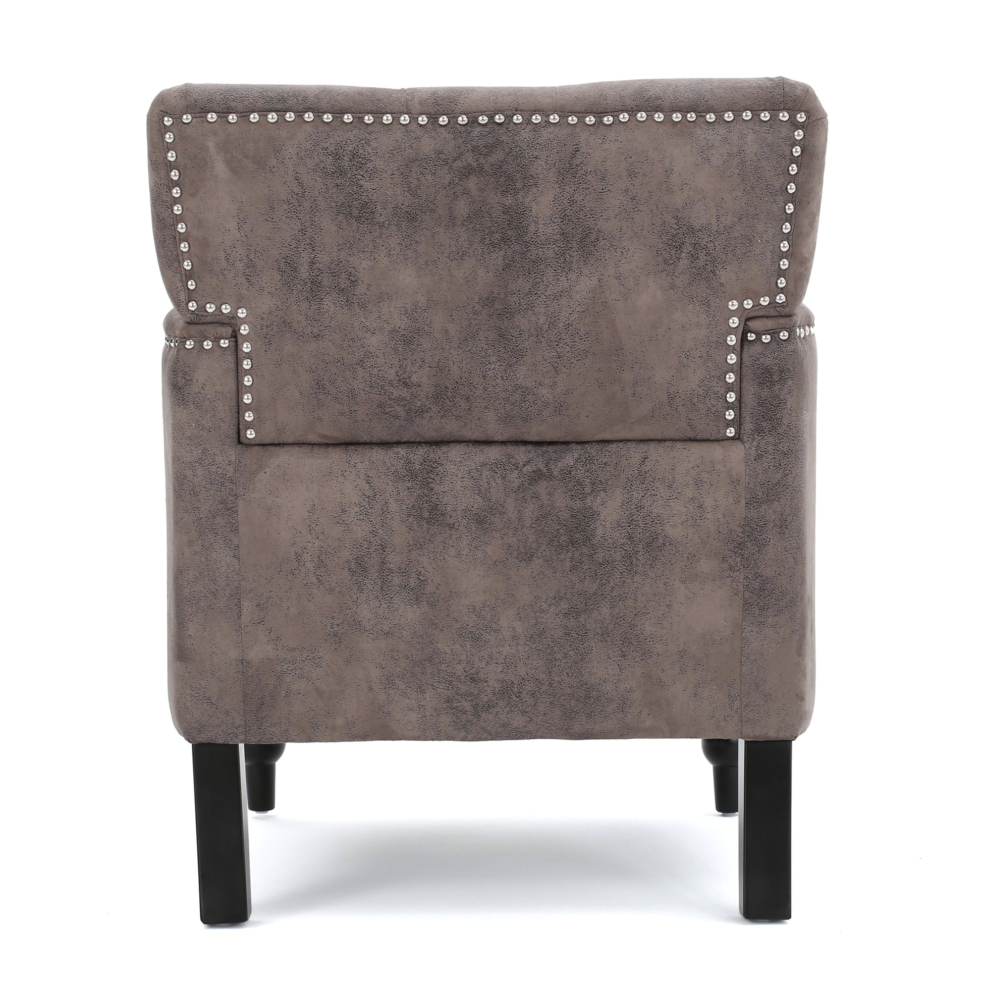 Tufted accent chair with silver nailhead trim in distressed brown faux leather