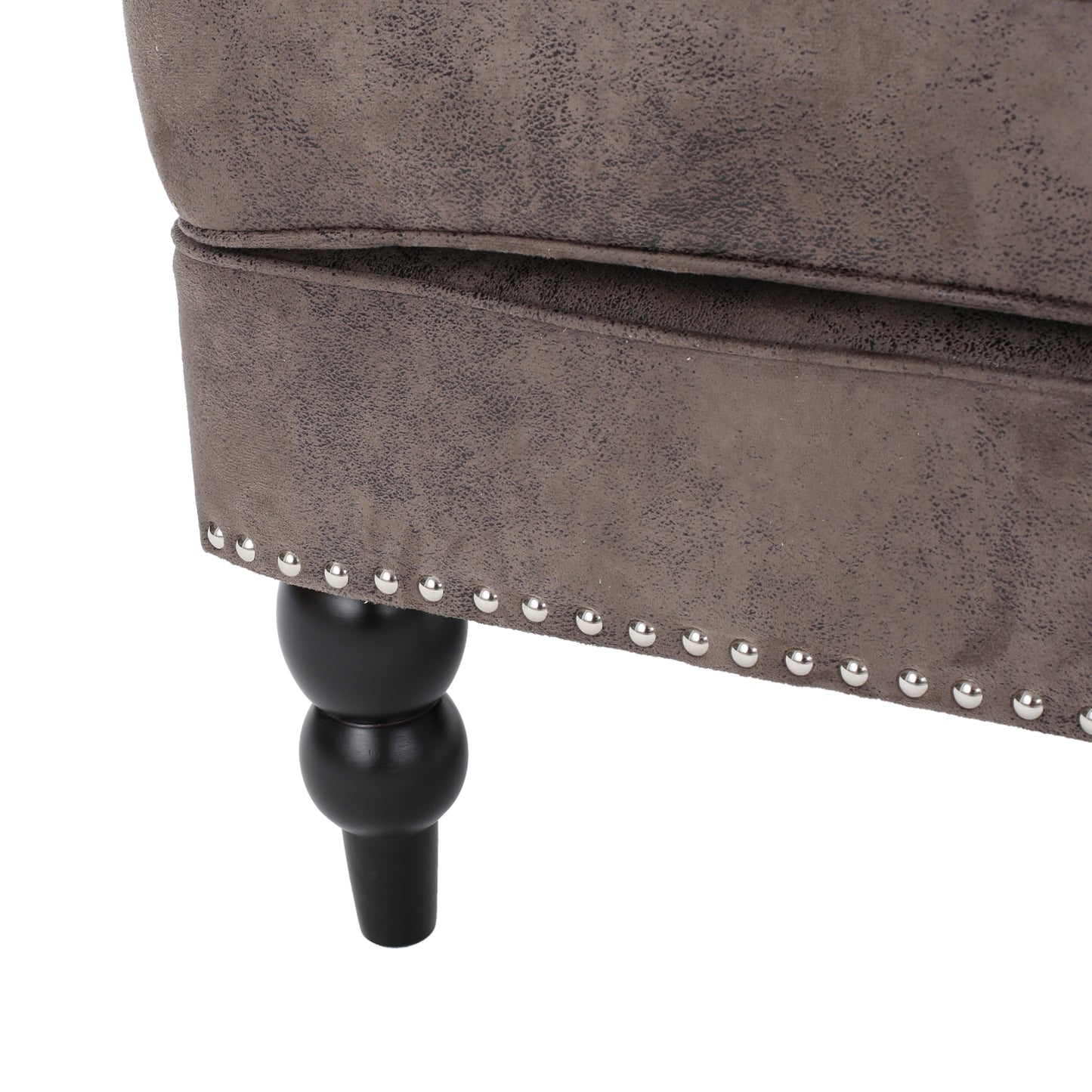 Brown faux leather armchair base with decorative nailhead trim and turned wooden leg