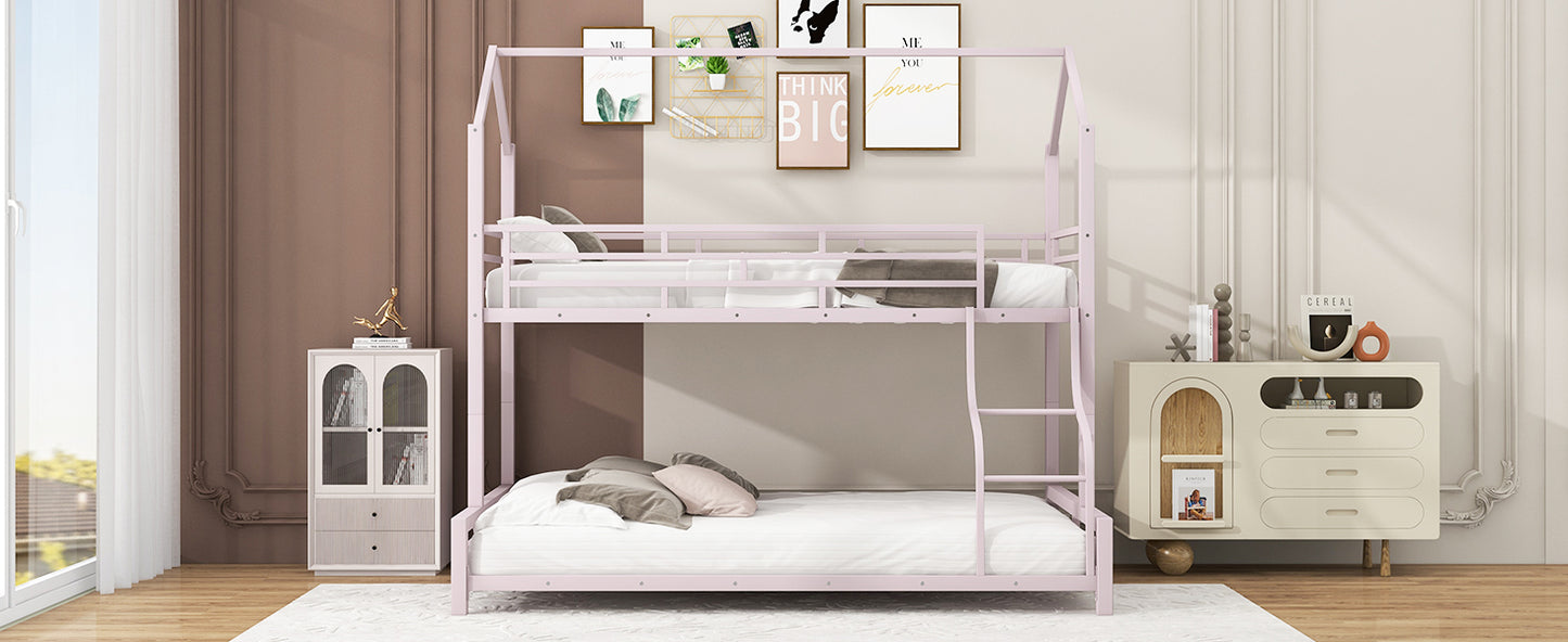 Pink metal houseshaped bunk bed with white bedding and grey pillows