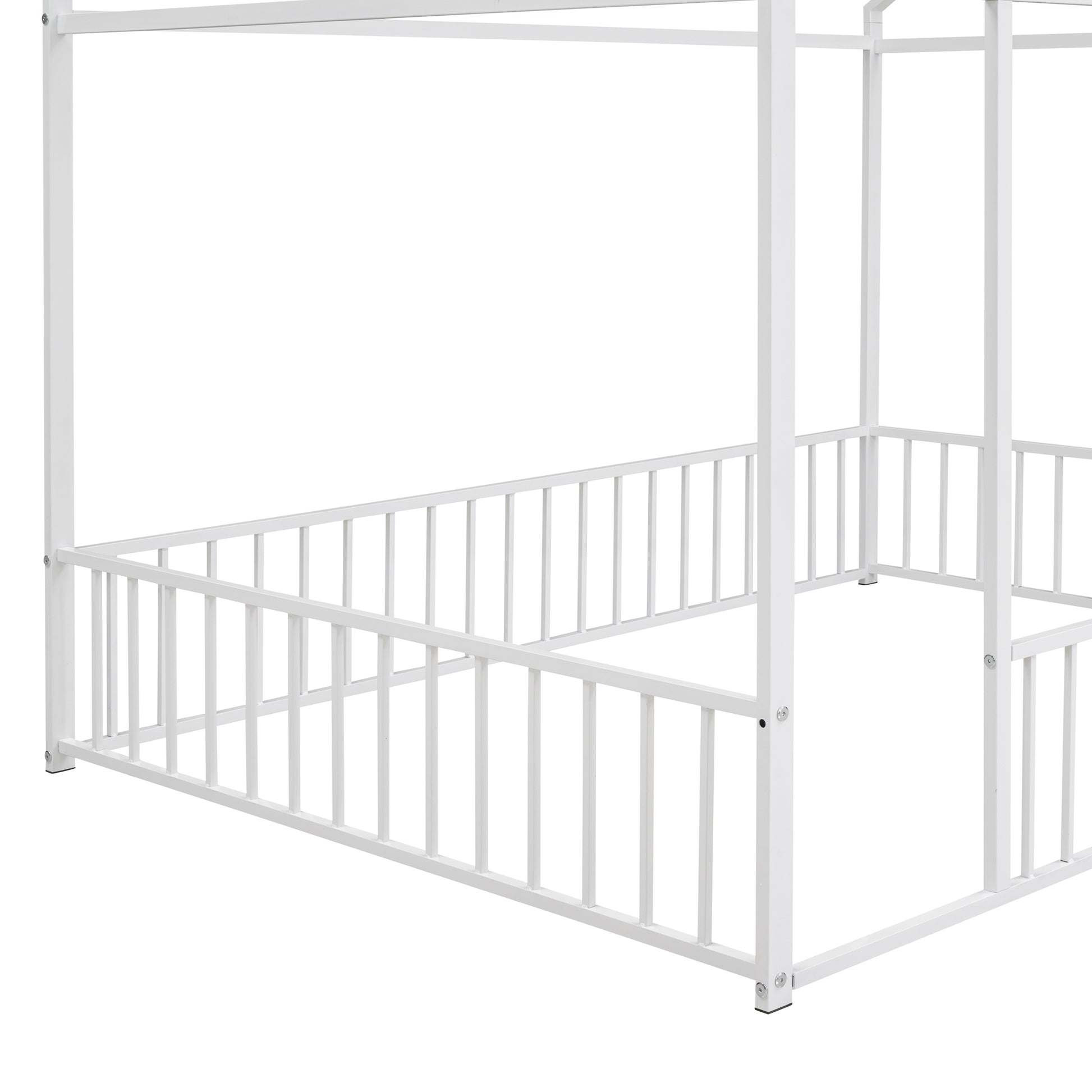 White metal canopy bed frame with a guardrail