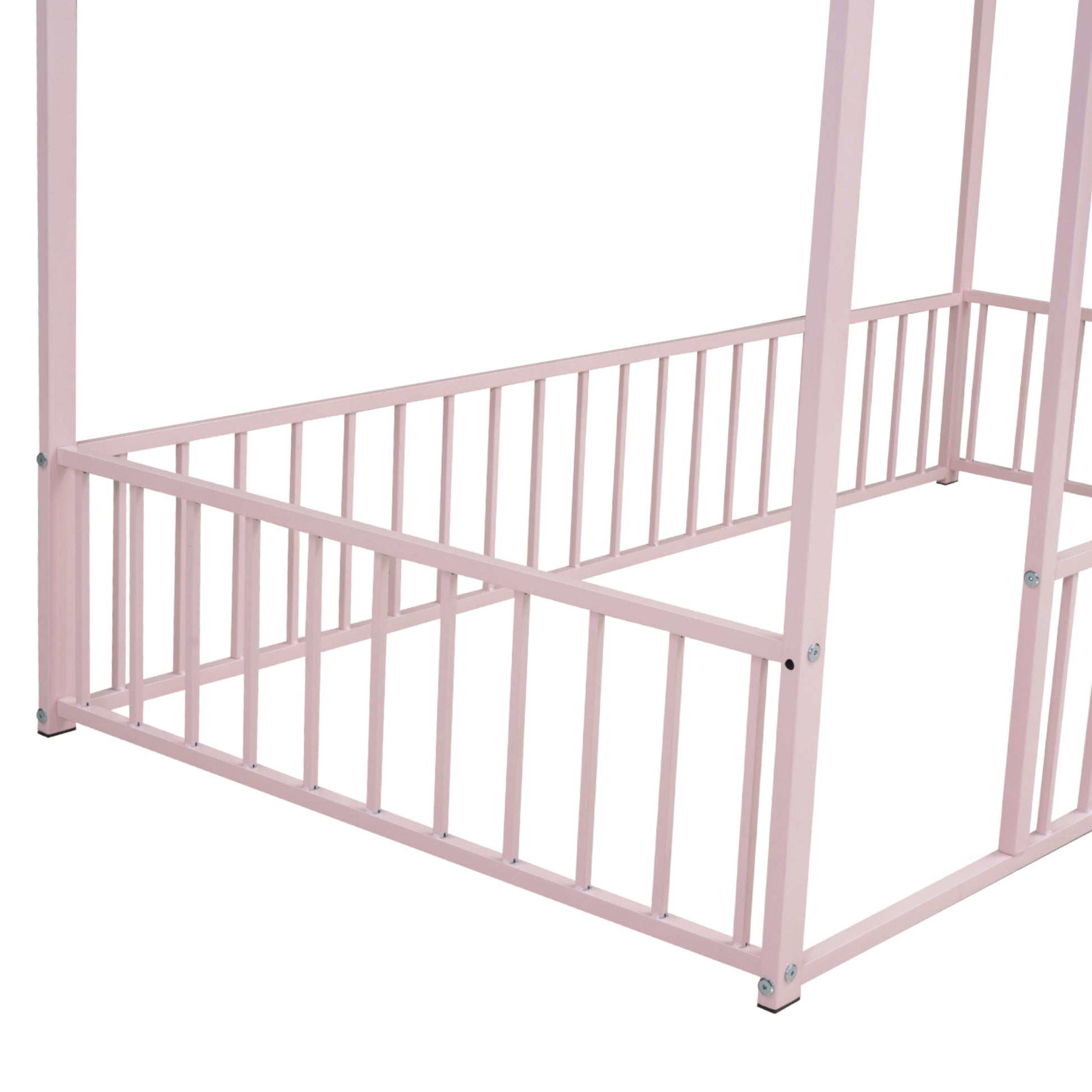 Pink metal canopy bed frame with railing for child