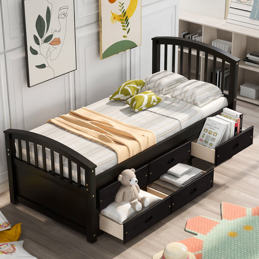 Black twin bed frame with three storage drawers and a teddy bear
