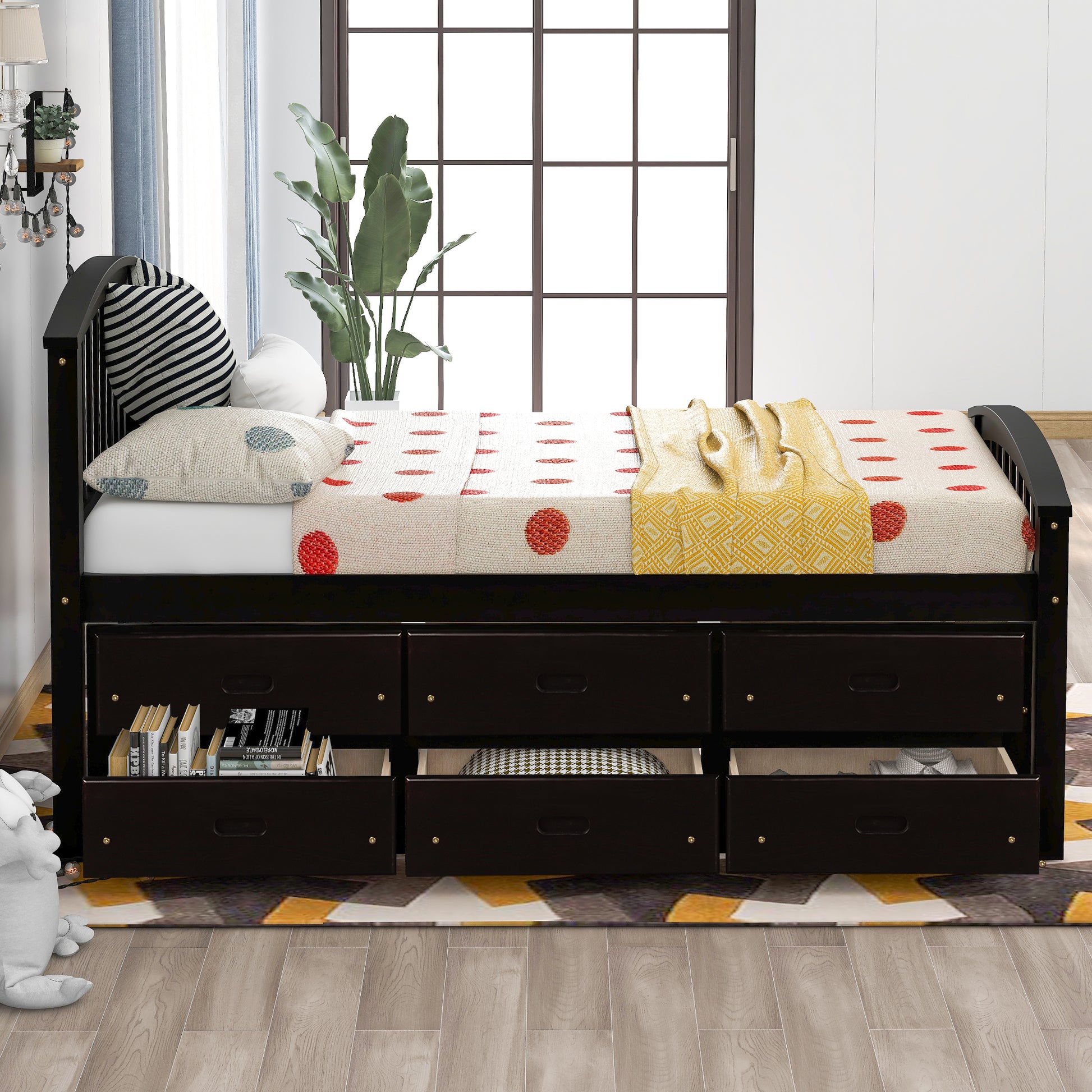 Dark brown wooden daybed with  drawers and striped bedding