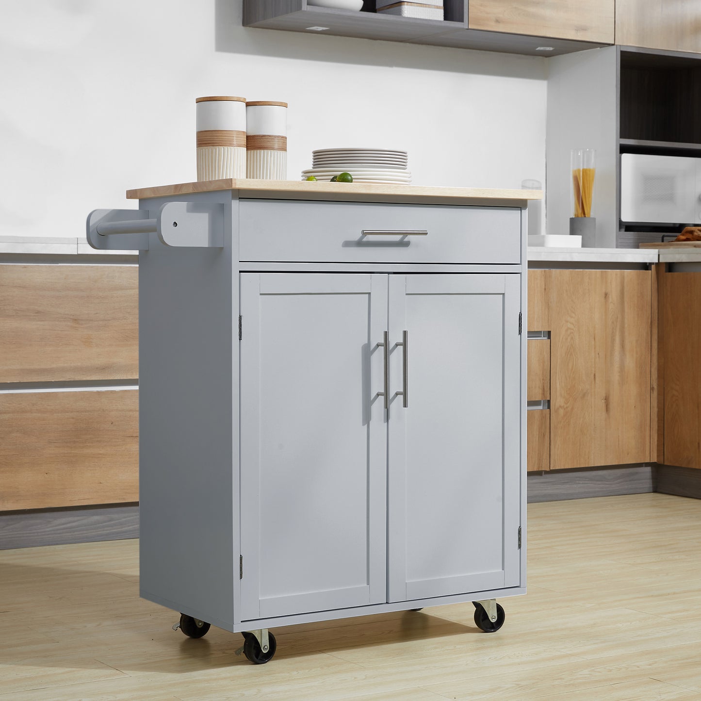 Grey kitchen cart with butcher block top and dual cabinet doors