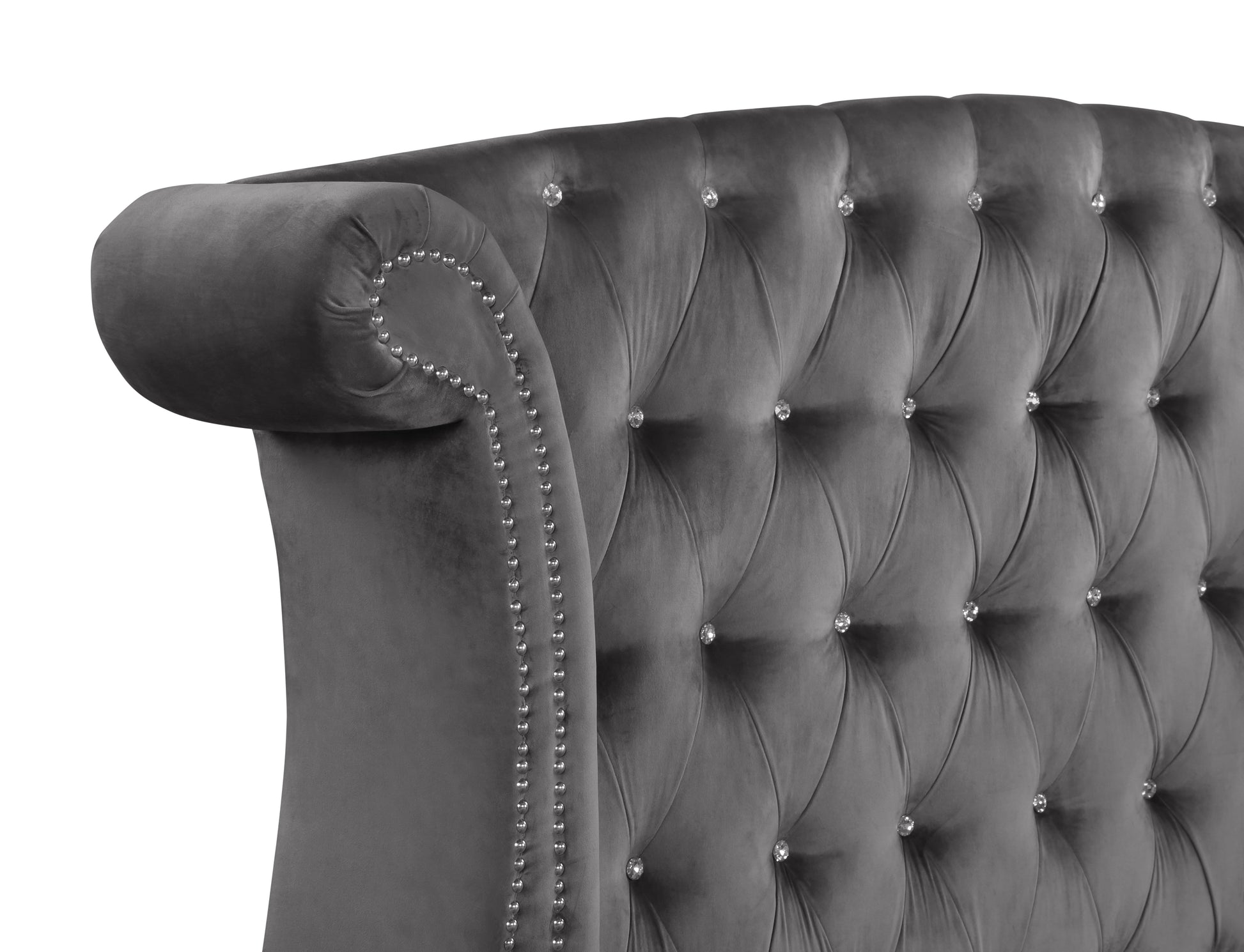 Gray velvet headboard with crystal tufting and nailhead trim detail