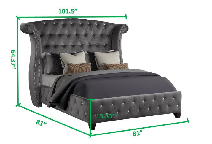Tufted grey velvet king bed with diamondlike crystal accents and a high wingback headboard