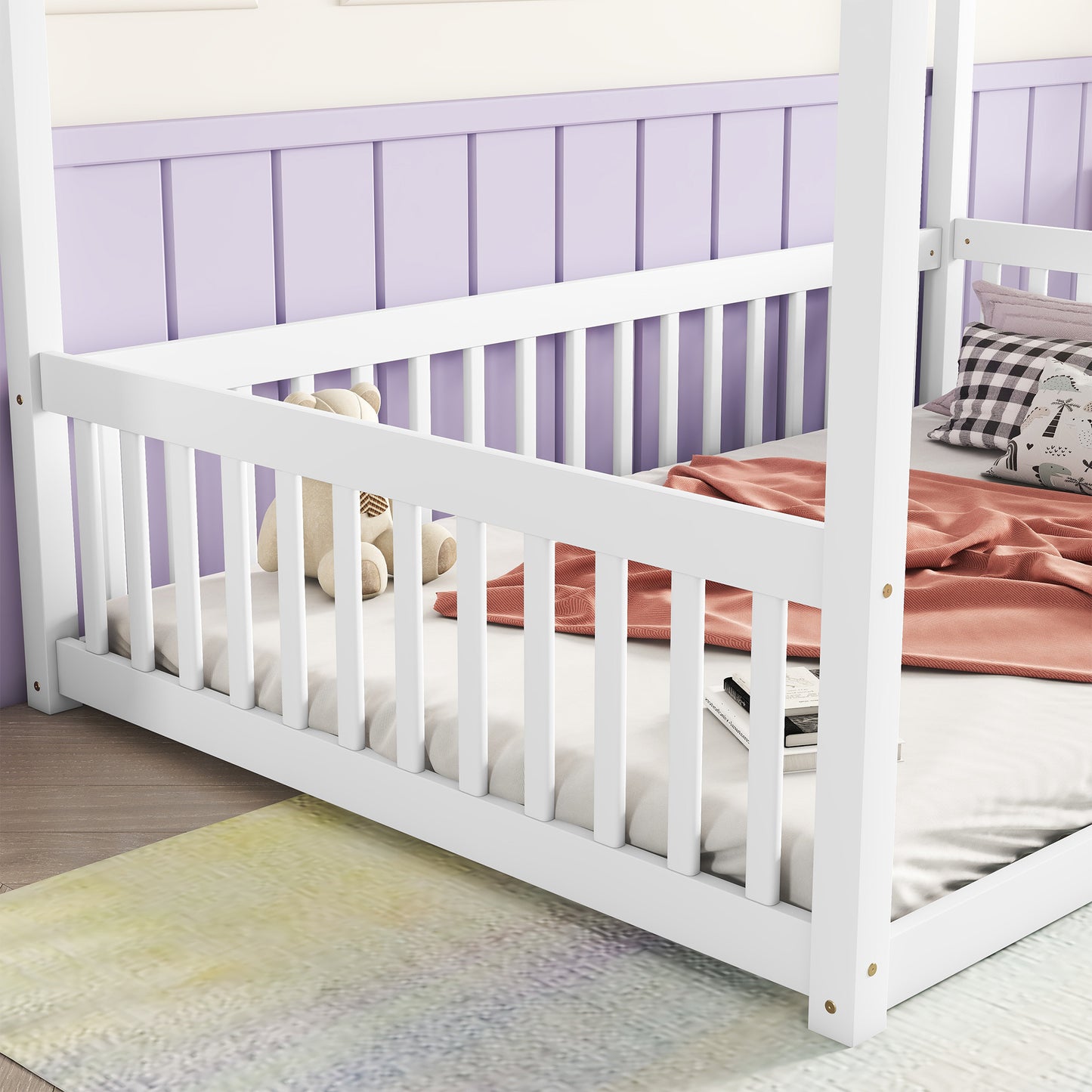 White wooden canopy bed frame with side rails and a teddy bear
