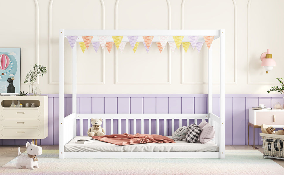 White toddler canopy bed with protective rails