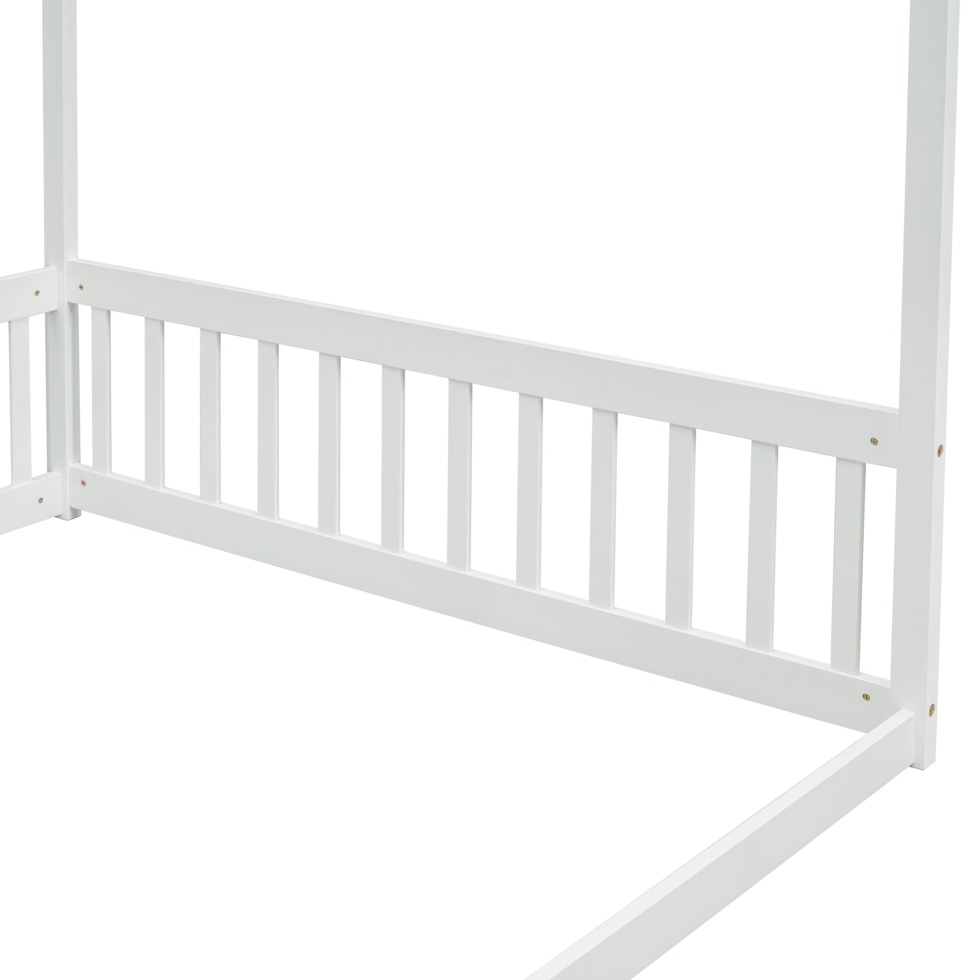 White wooden canopy bed frame detail with vertical slats