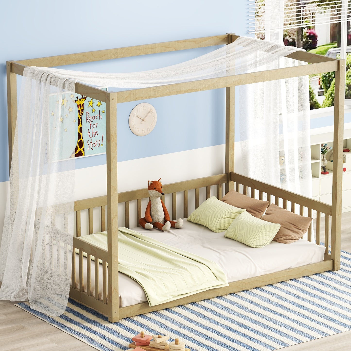 Natural wood fourposter kids bed frame with sheer canopy and soft bedding