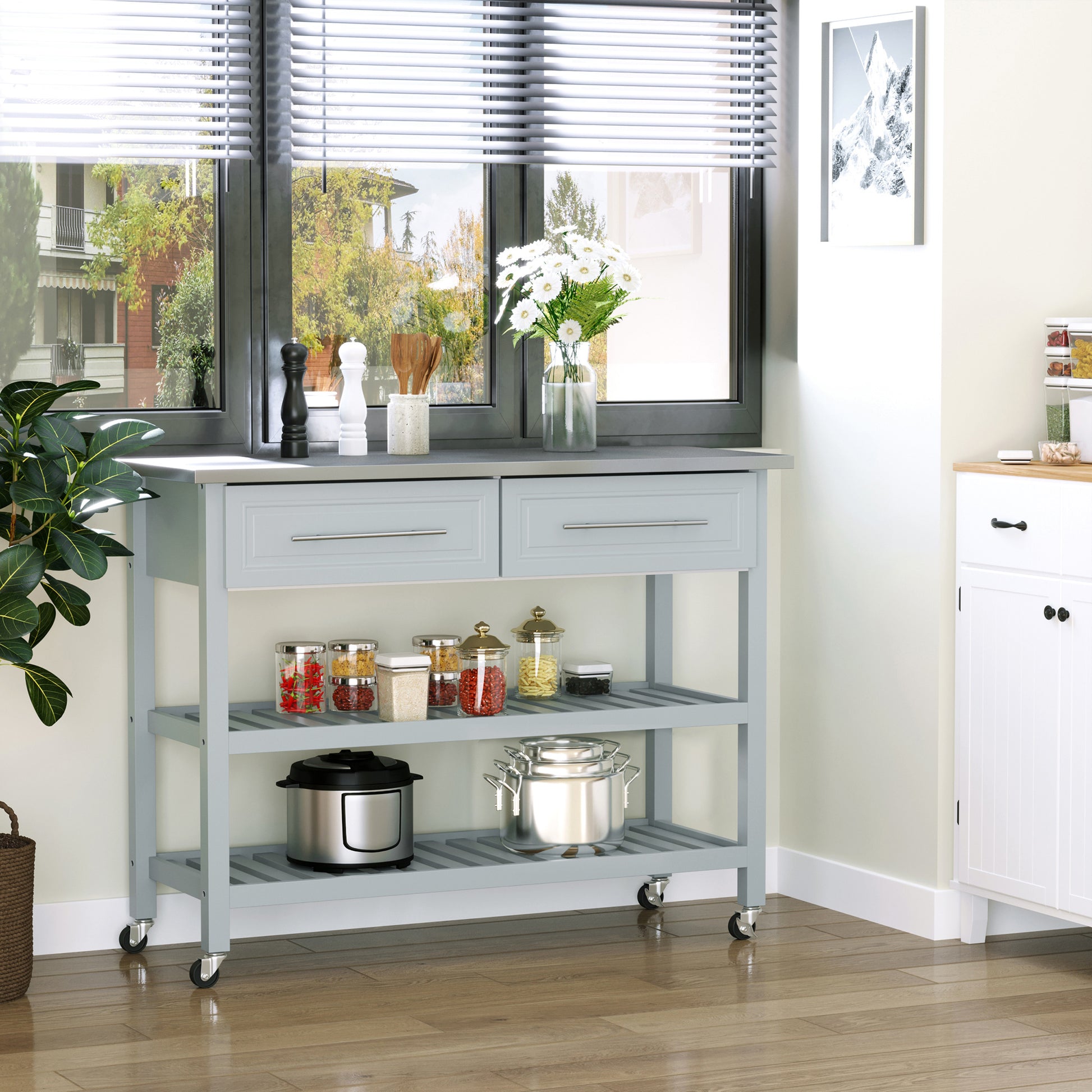 Gray kitchen island cart with two drawers and slatted shelves