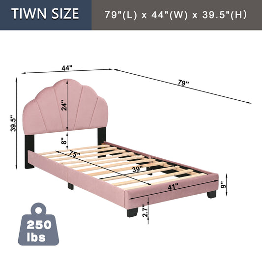 Pink velvet twin bed frame with scalloped headboard